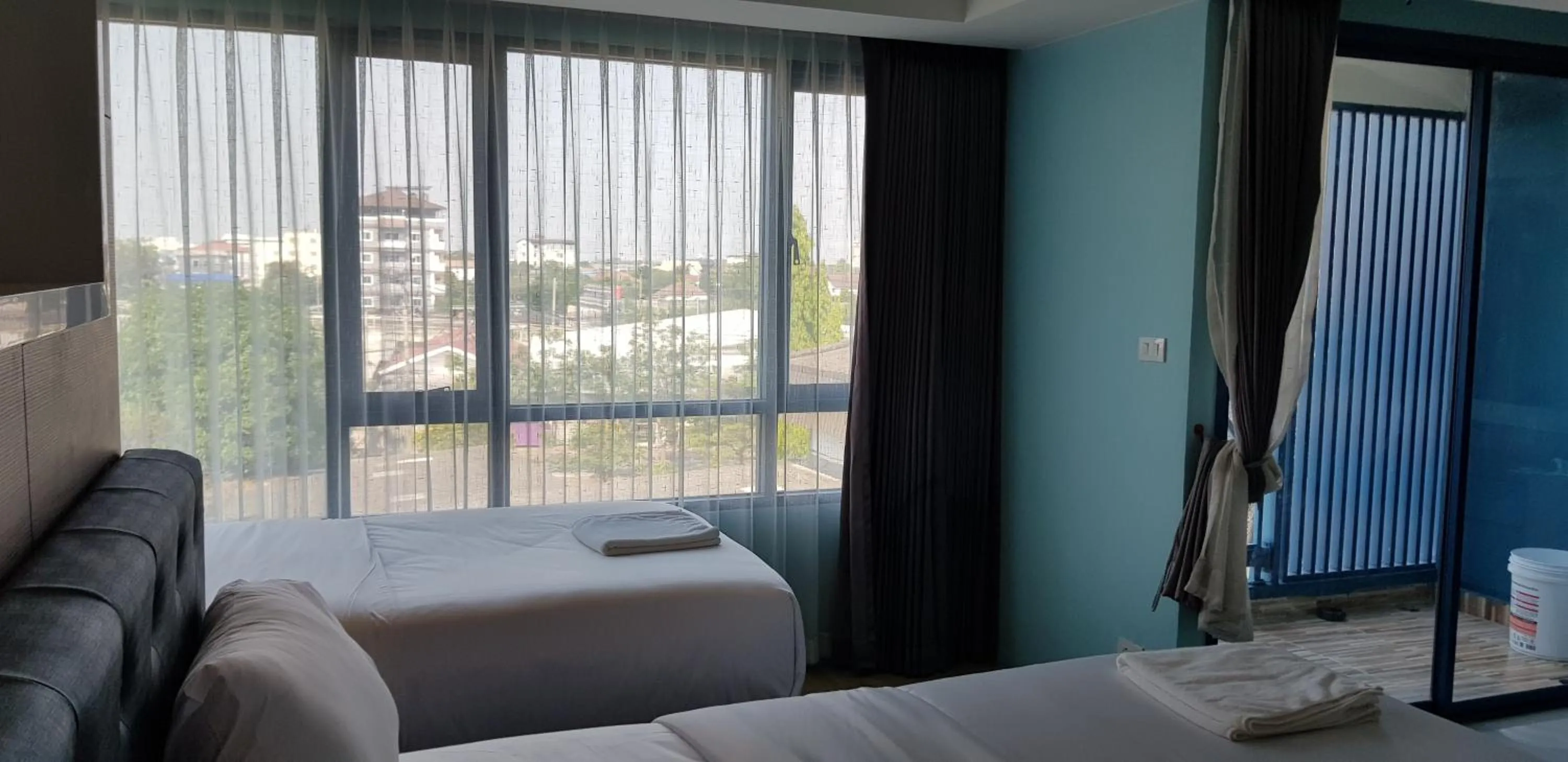 Bed in BlueTel Re'sidencE Bangkok IMPACT บลูเทล เรซิดองส์ กรุงเทพ อิมแพค