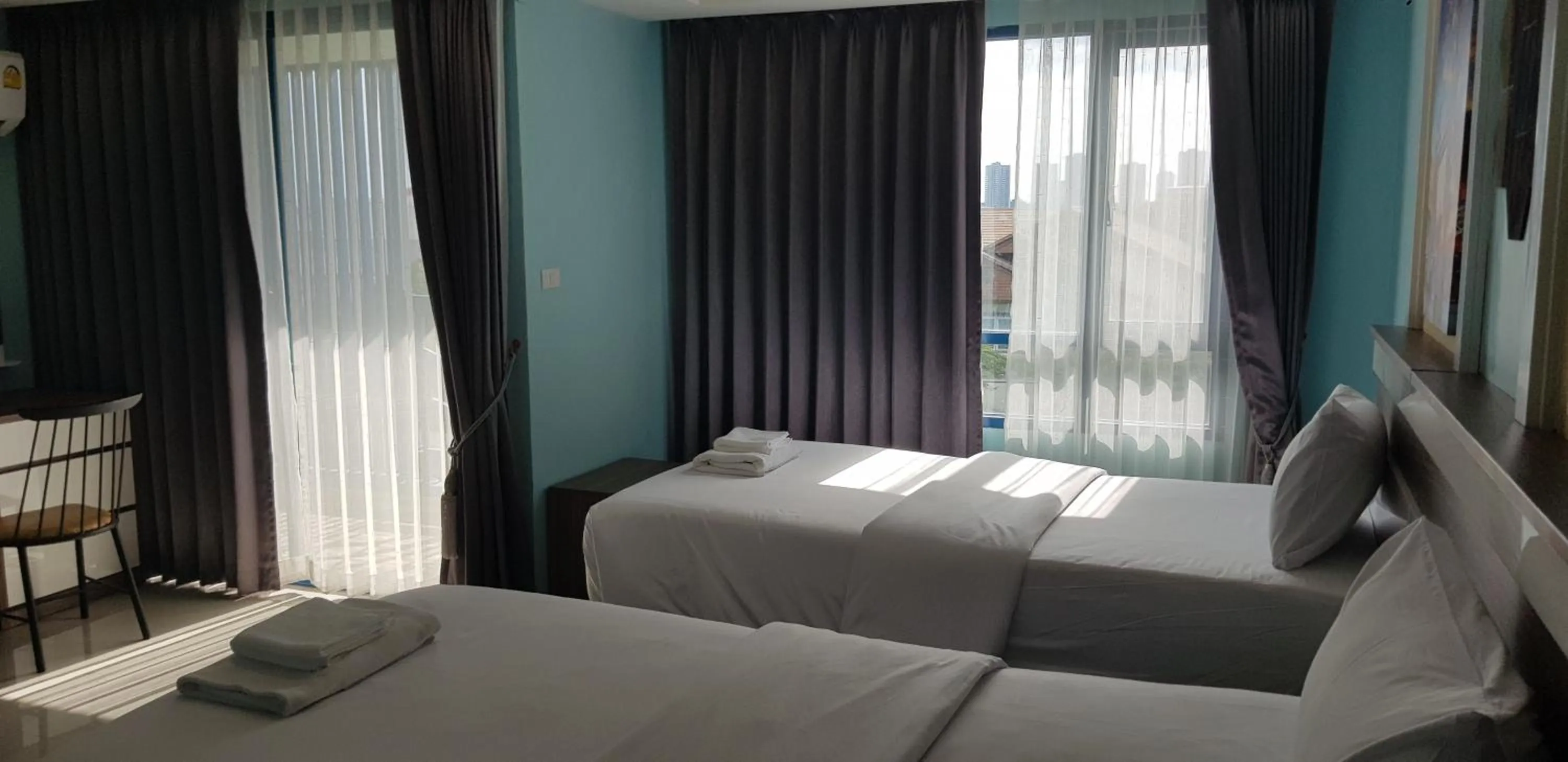 Bed in BlueTel Re'sidencE Bangkok IMPACT บลูเทล เรซิดองส์ กรุงเทพ อิมแพค