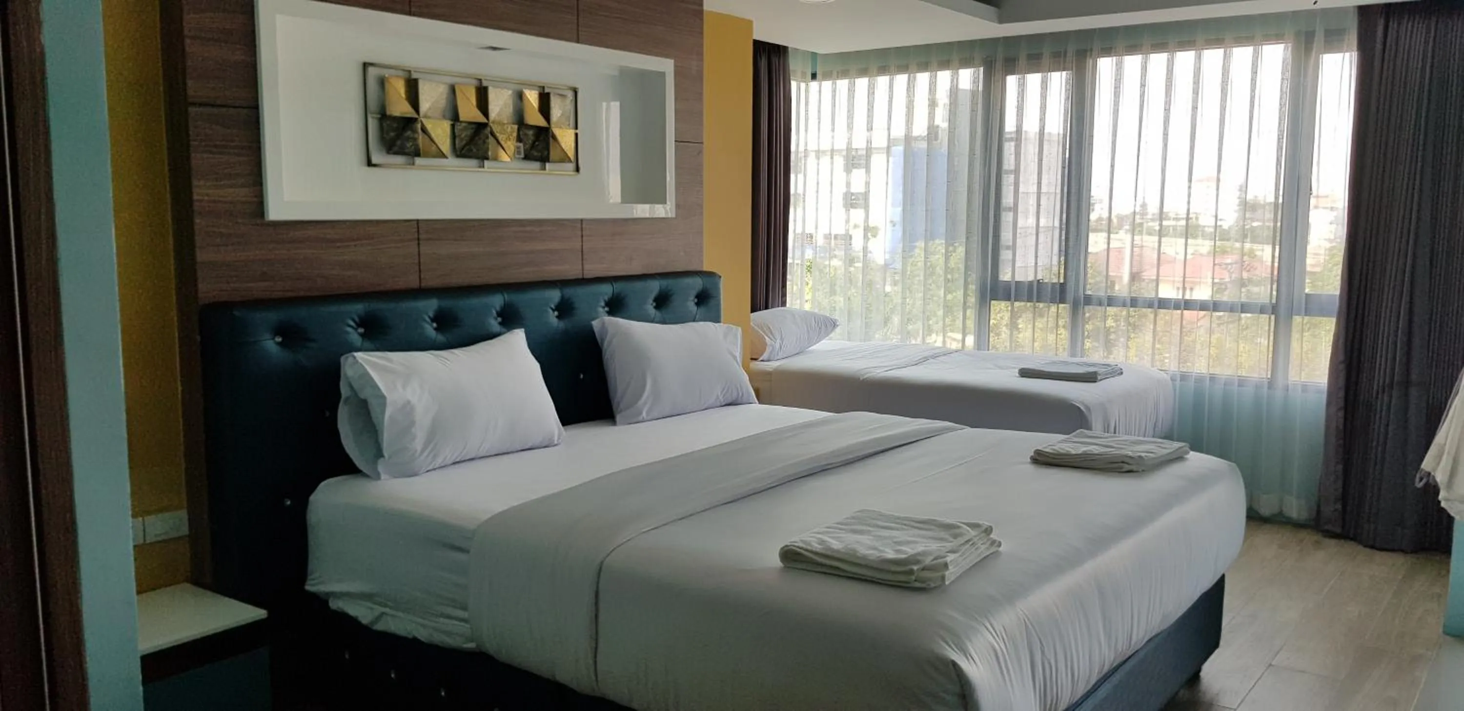 Bed in BlueTel Re'sidencE Bangkok IMPACT บลูเทล เรซิดองส์ กรุงเทพ อิมแพค