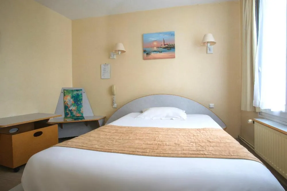 Bed in Hotel De Rosny