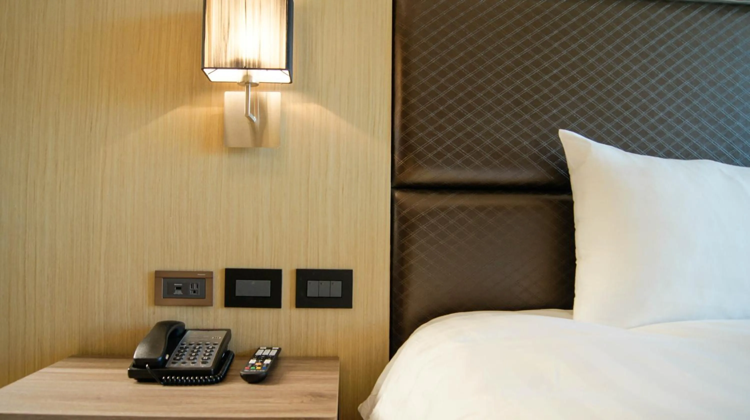 Bed in Kuei Ti Wan Hotel