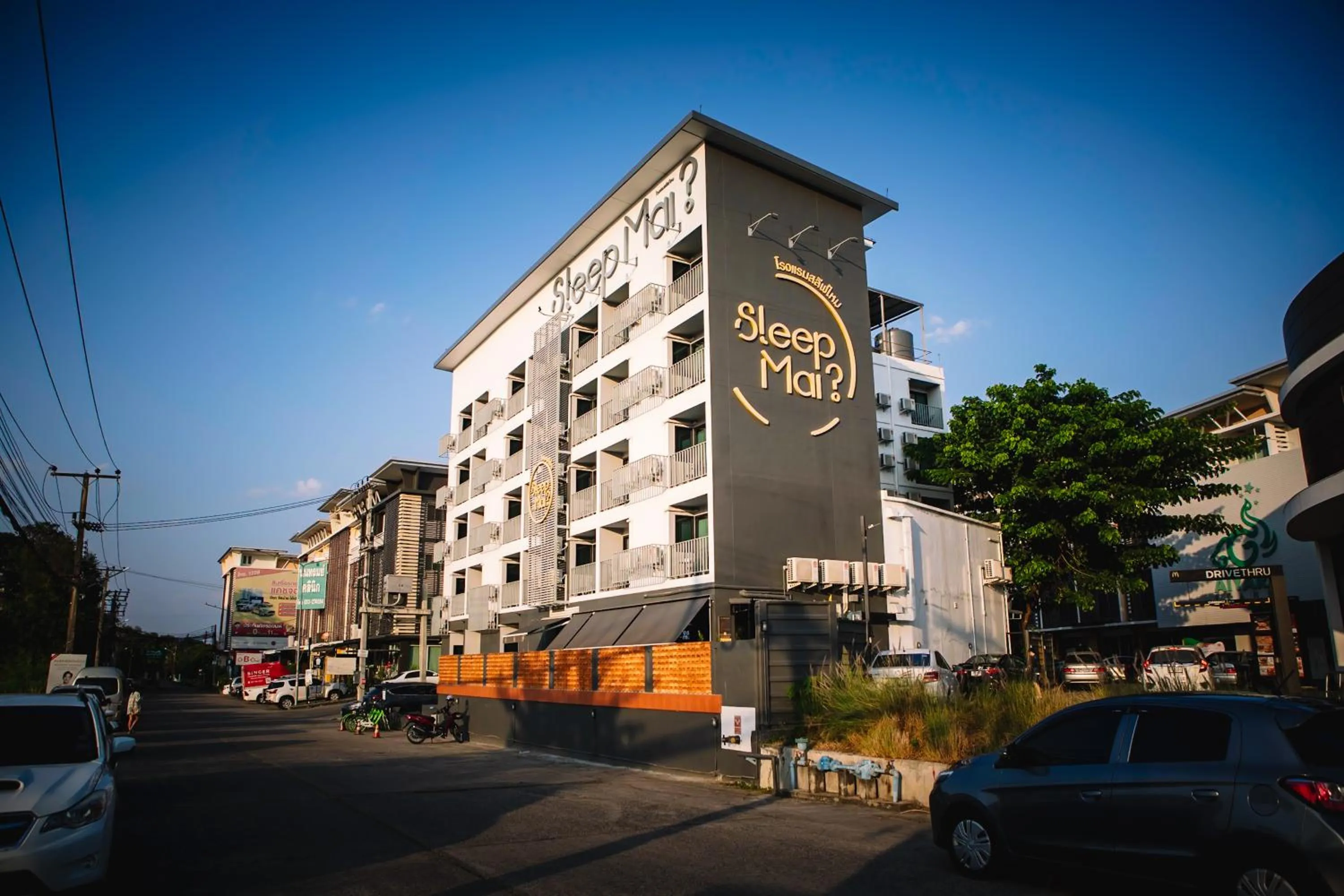 Property building in Sleep Mai Chiang Mai Airport Lifestyle Hotel