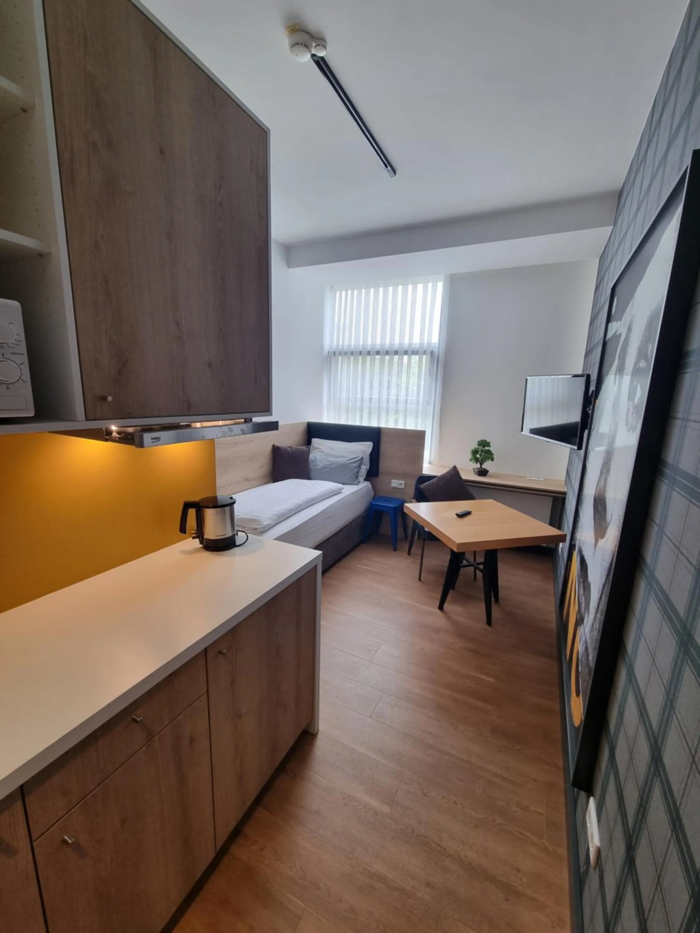 Photo of the whole room in my MINGA Airport serviced Apartments