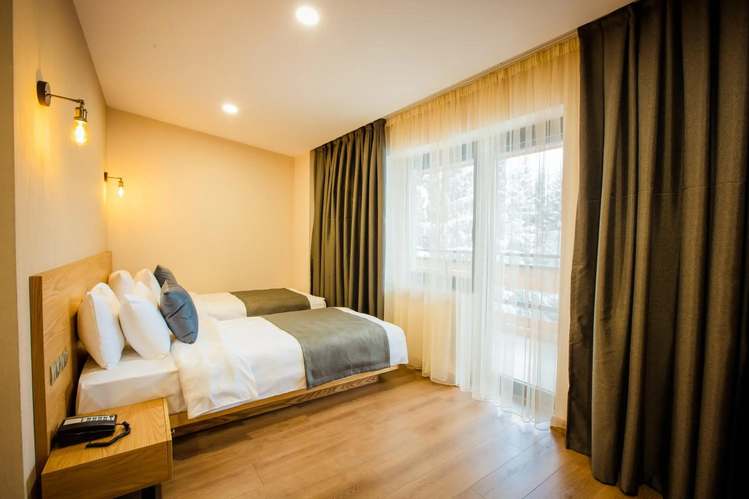 Twin Room with Garden View in Bakuriani Inn Twin Room with Garden View in Bakuriani Inn