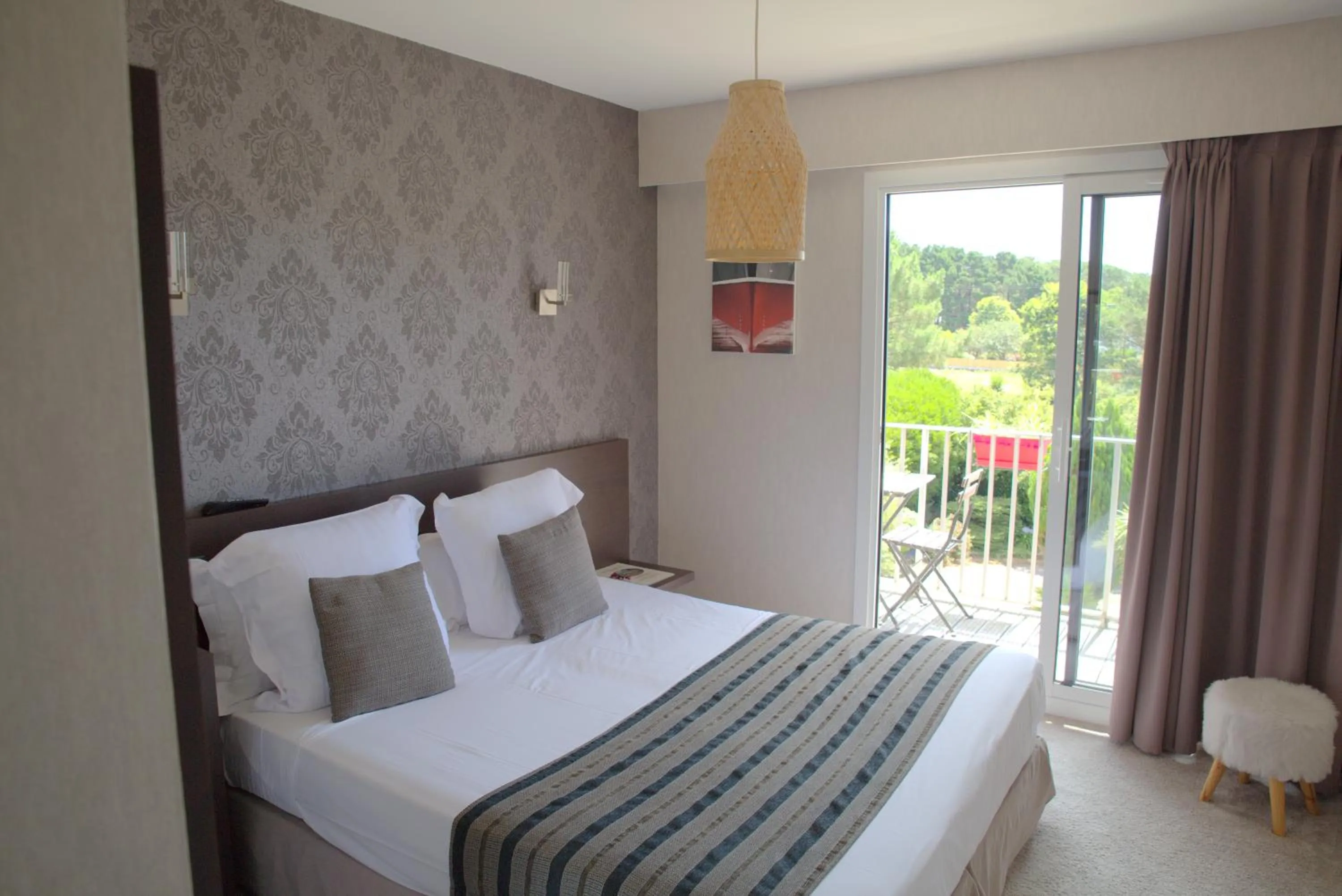 Bed in Le Galet Hotel & Spa