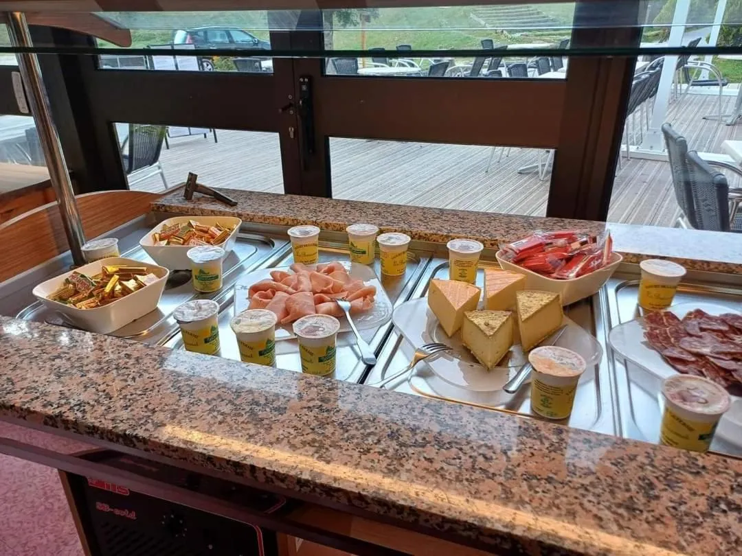 Buffet breakfast in Hôtel Espace Montclar