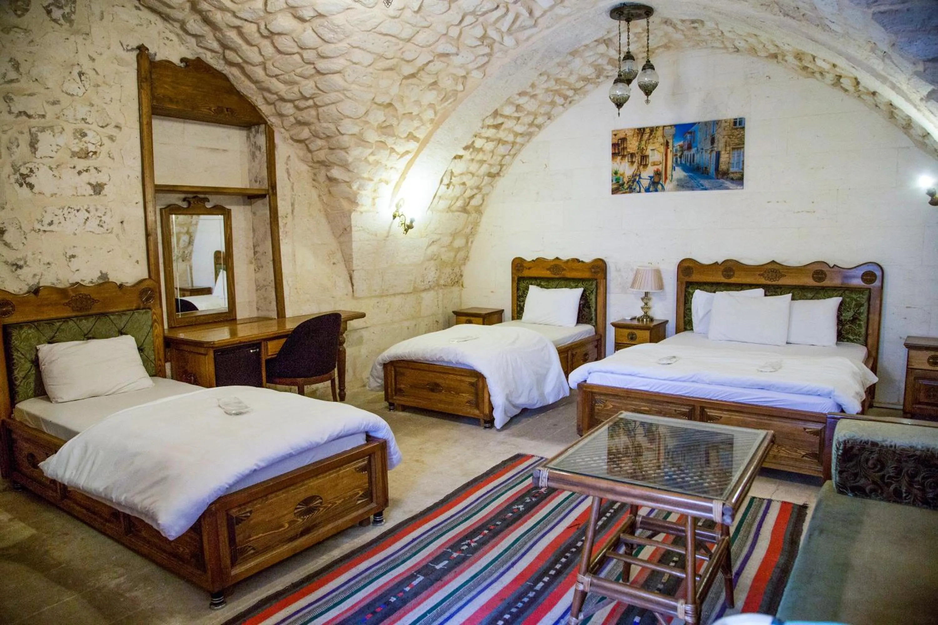 Bed in PALMYRA BOUTIQUE HOTEL