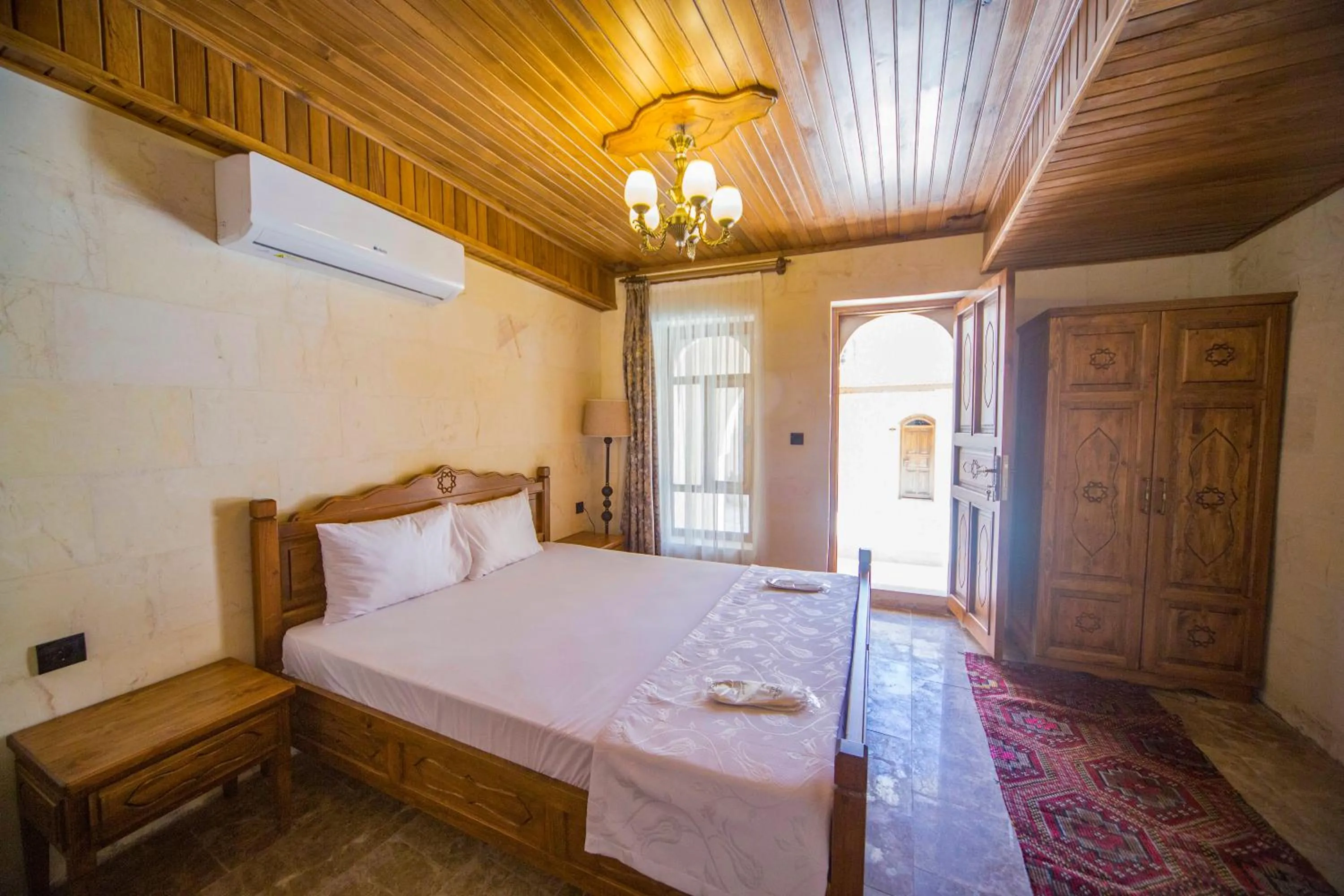 Bed in PALMYRA BOUTIQUE HOTEL