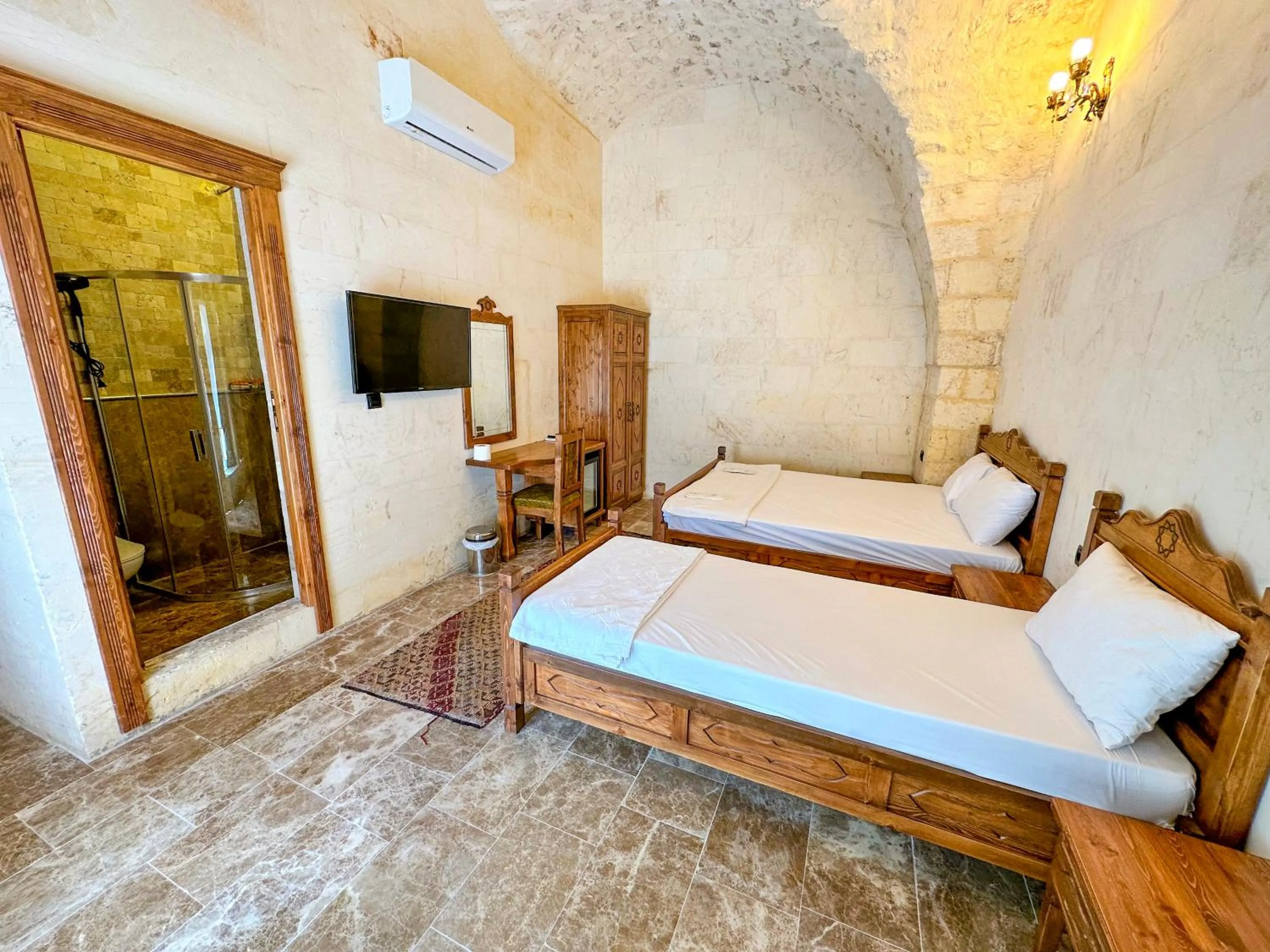 Bed in PALMYRA BOUTIQUE HOTEL