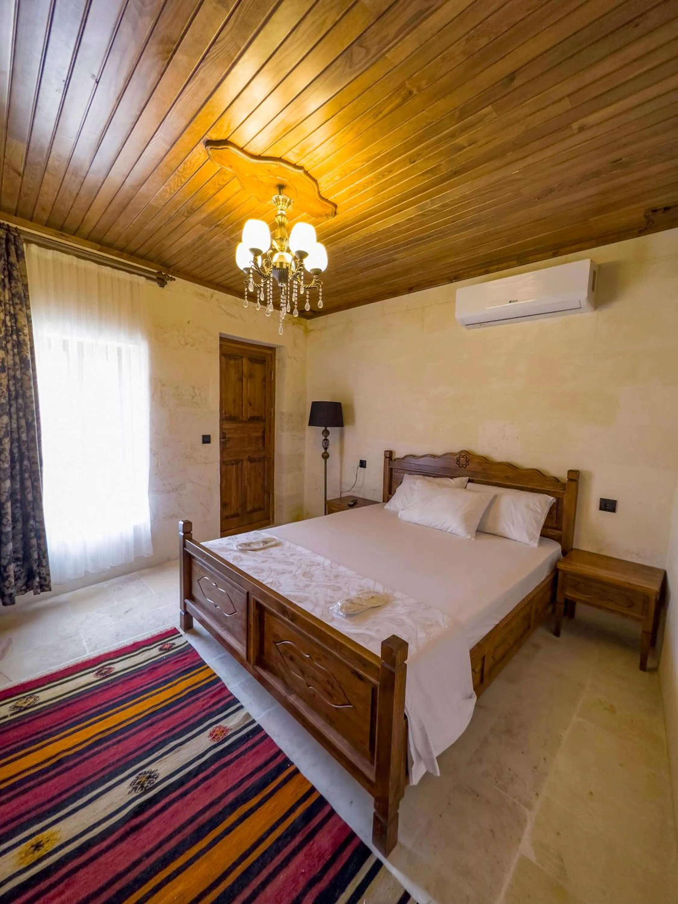 Bed in PALMYRA BOUTIQUE HOTEL