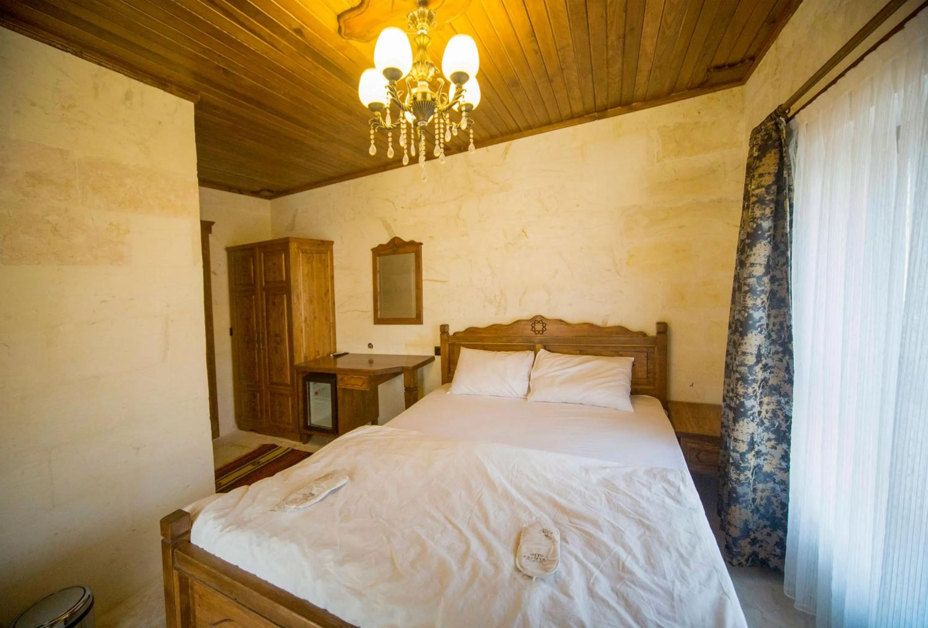 Bed in PALMYRA BOUTIQUE HOTEL