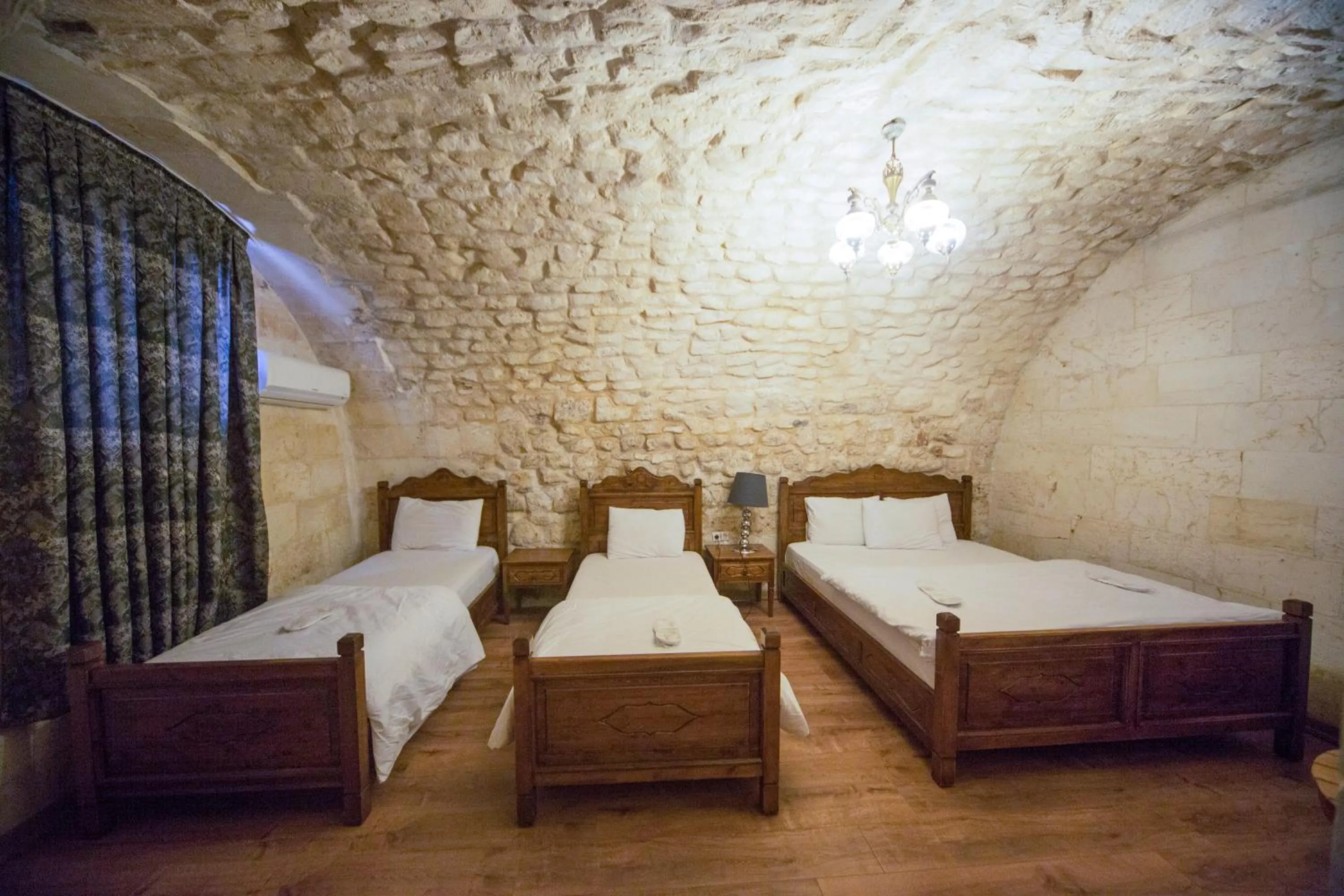 Bed in PALMYRA BOUTIQUE HOTEL