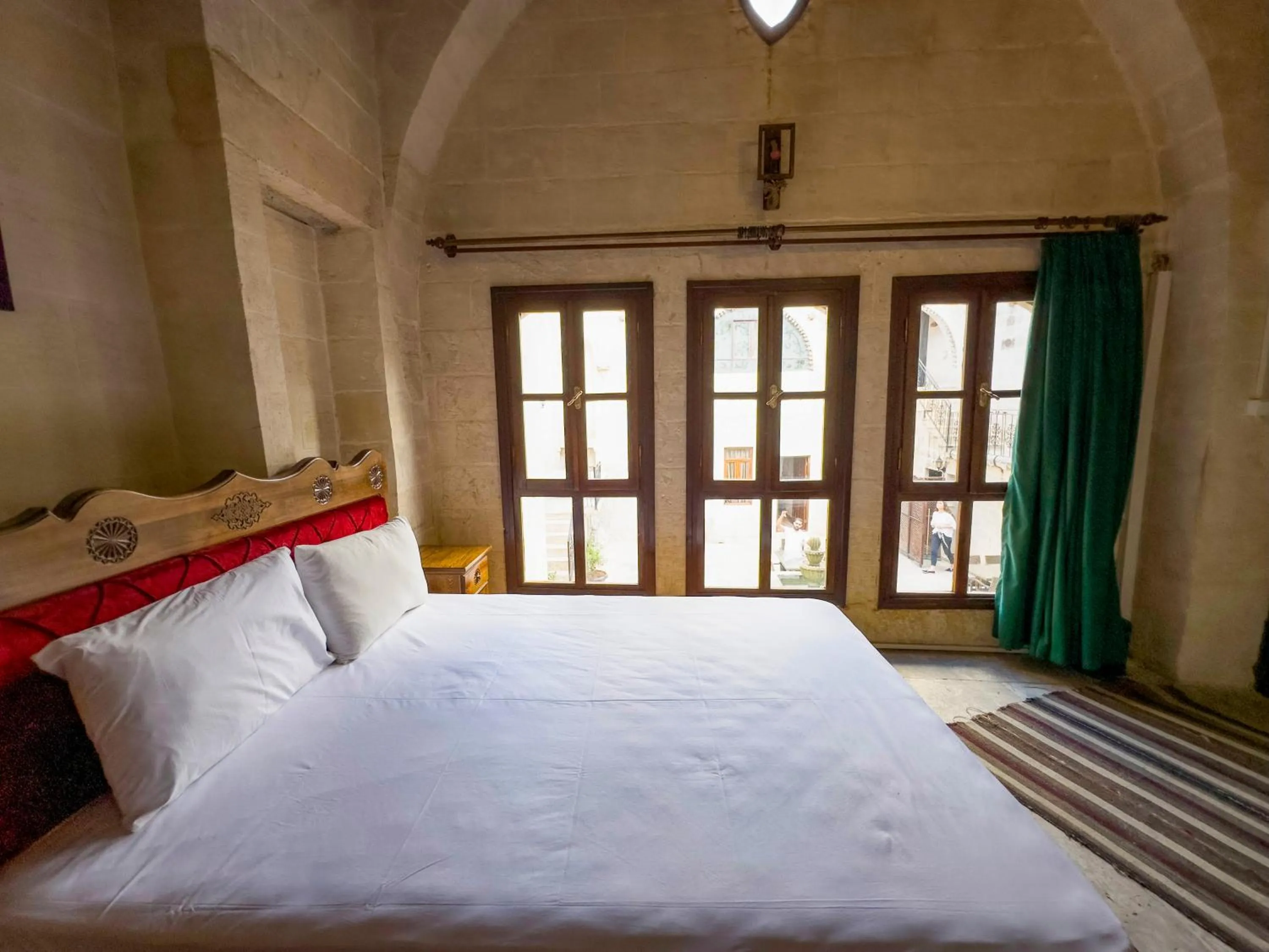 Bed in PALMYRA BOUTIQUE HOTEL