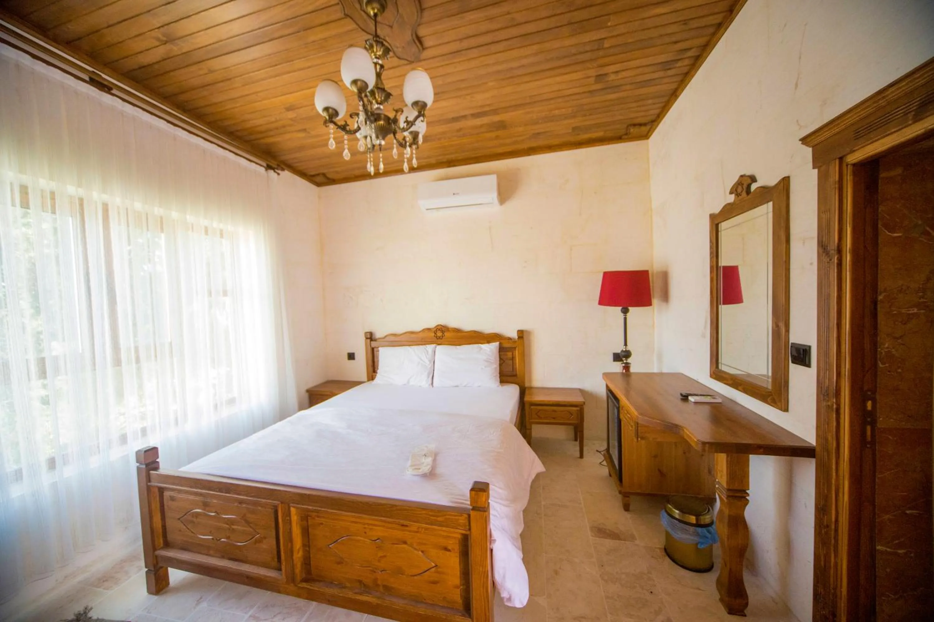 Bed in PALMYRA BOUTIQUE HOTEL