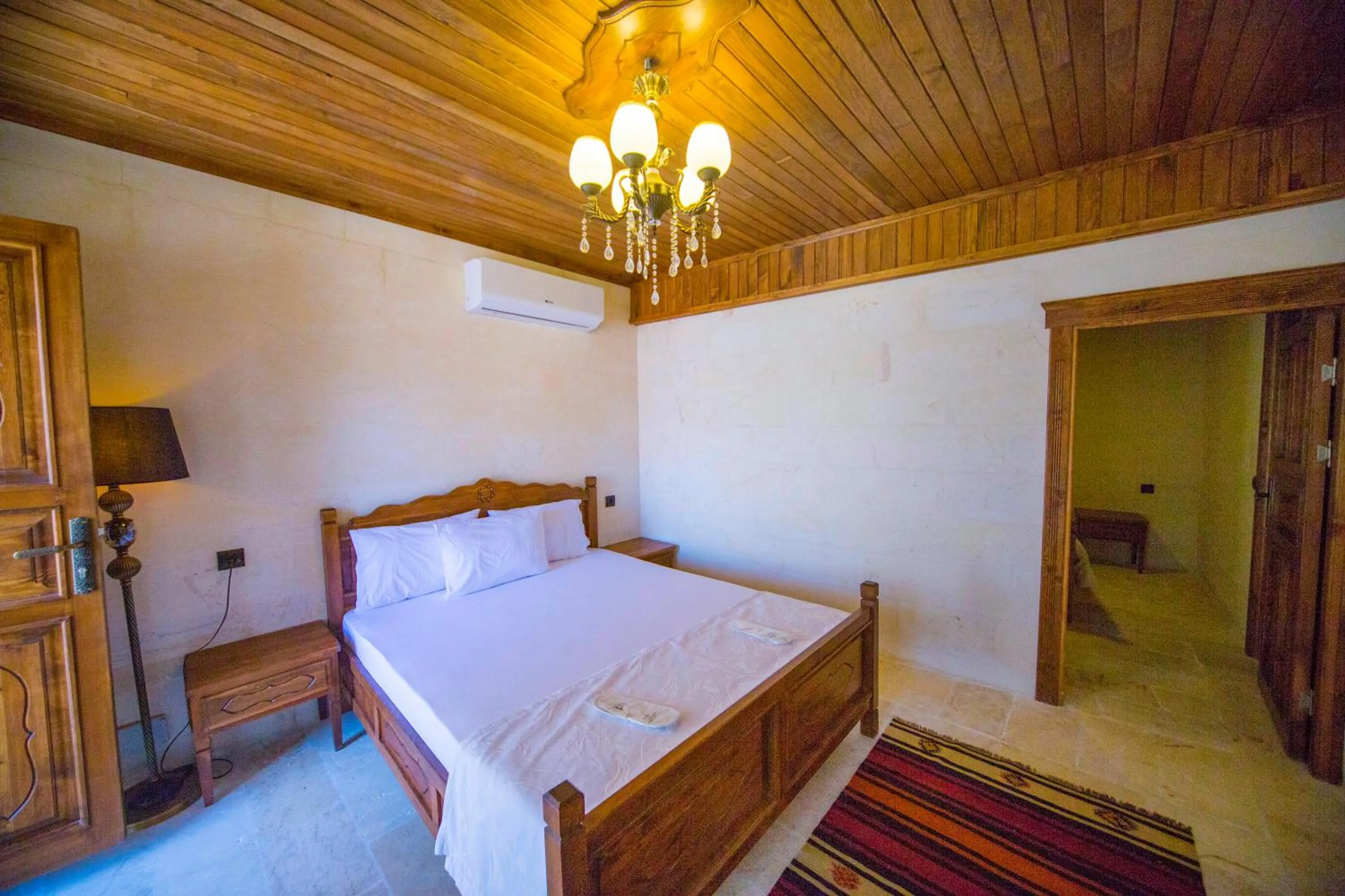 Bed in PALMYRA BOUTIQUE HOTEL