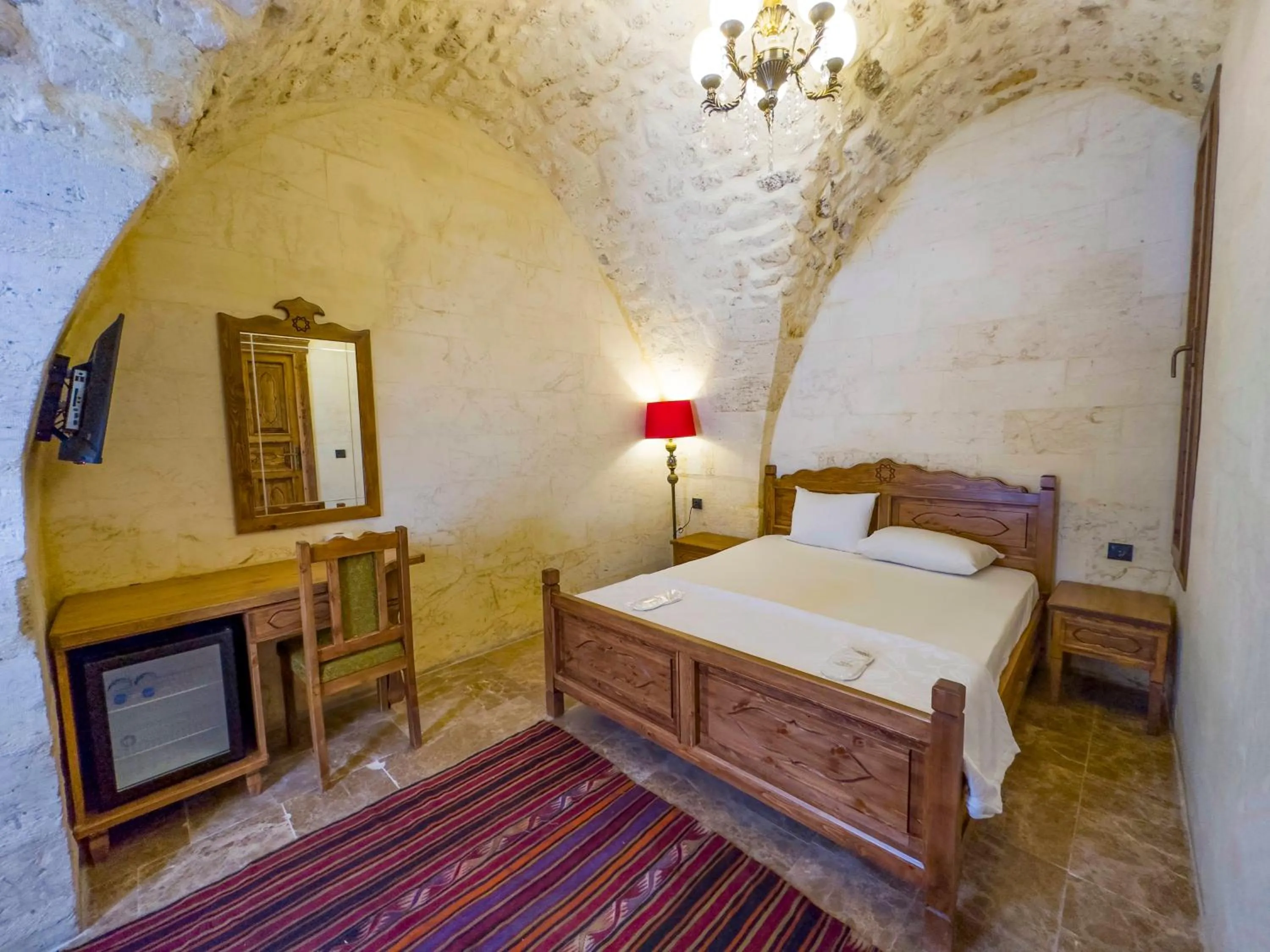 Bed in PALMYRA BOUTIQUE HOTEL