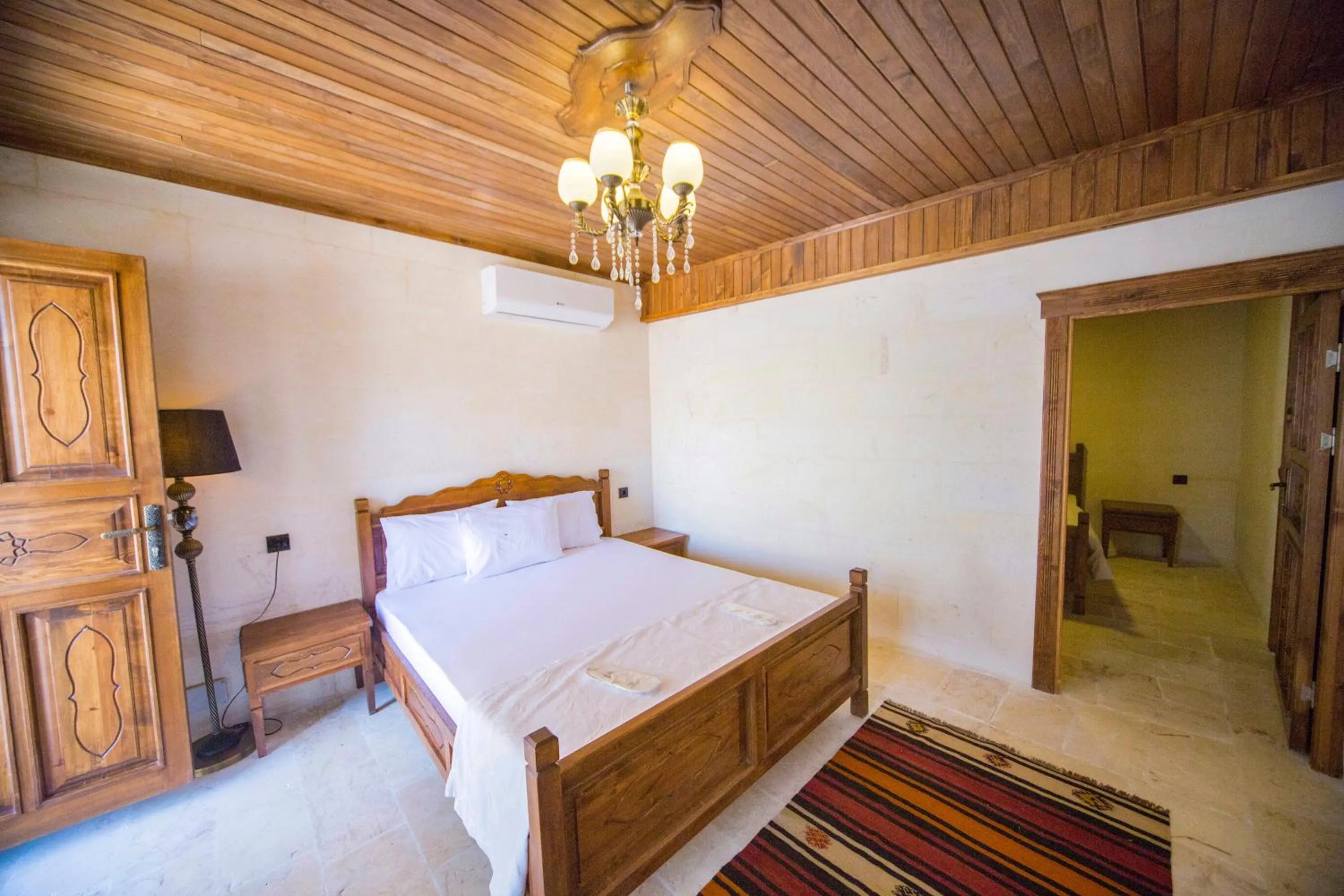 Bed in PALMYRA BOUTIQUE HOTEL