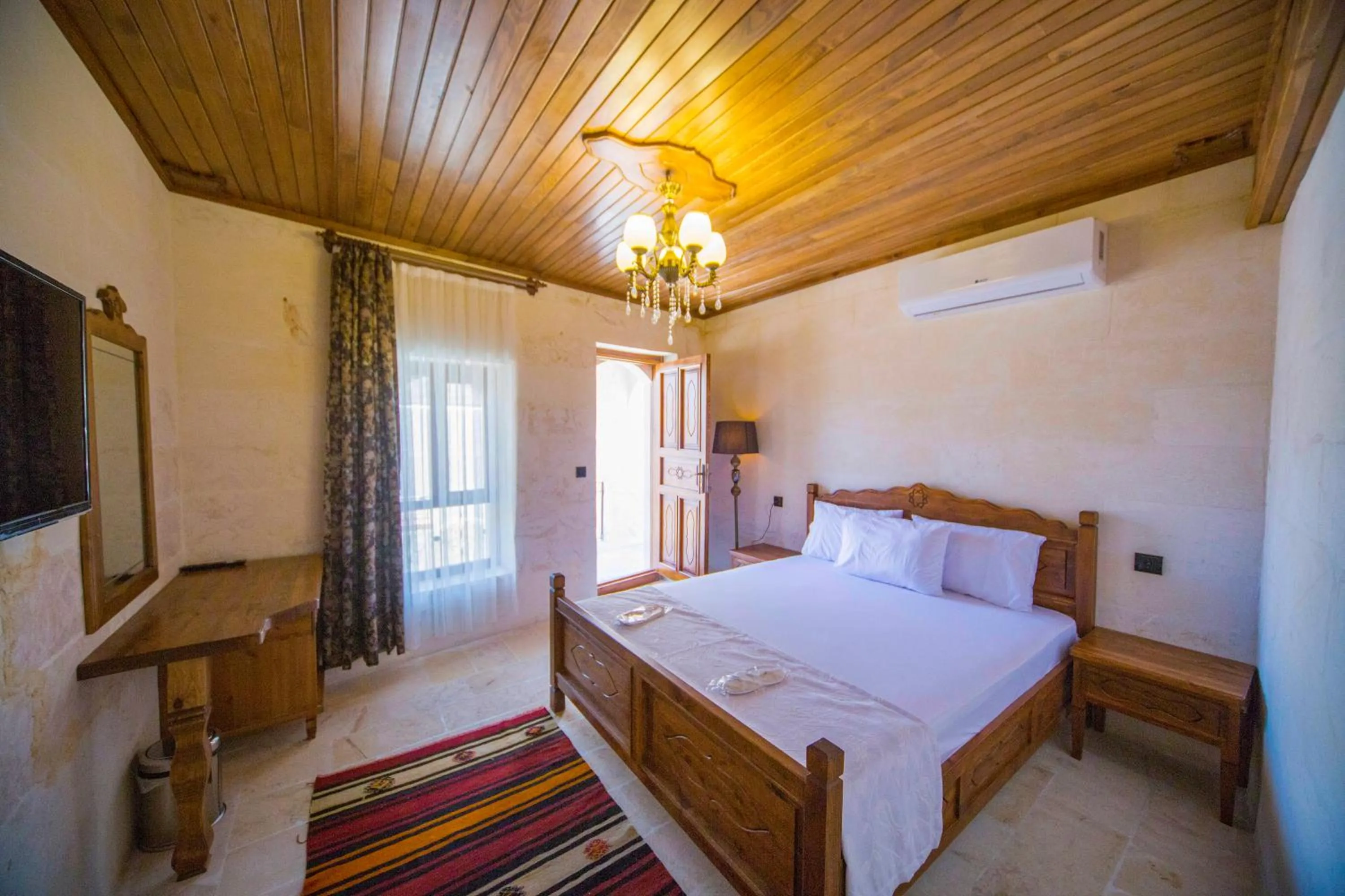 Bed in PALMYRA BOUTIQUE HOTEL