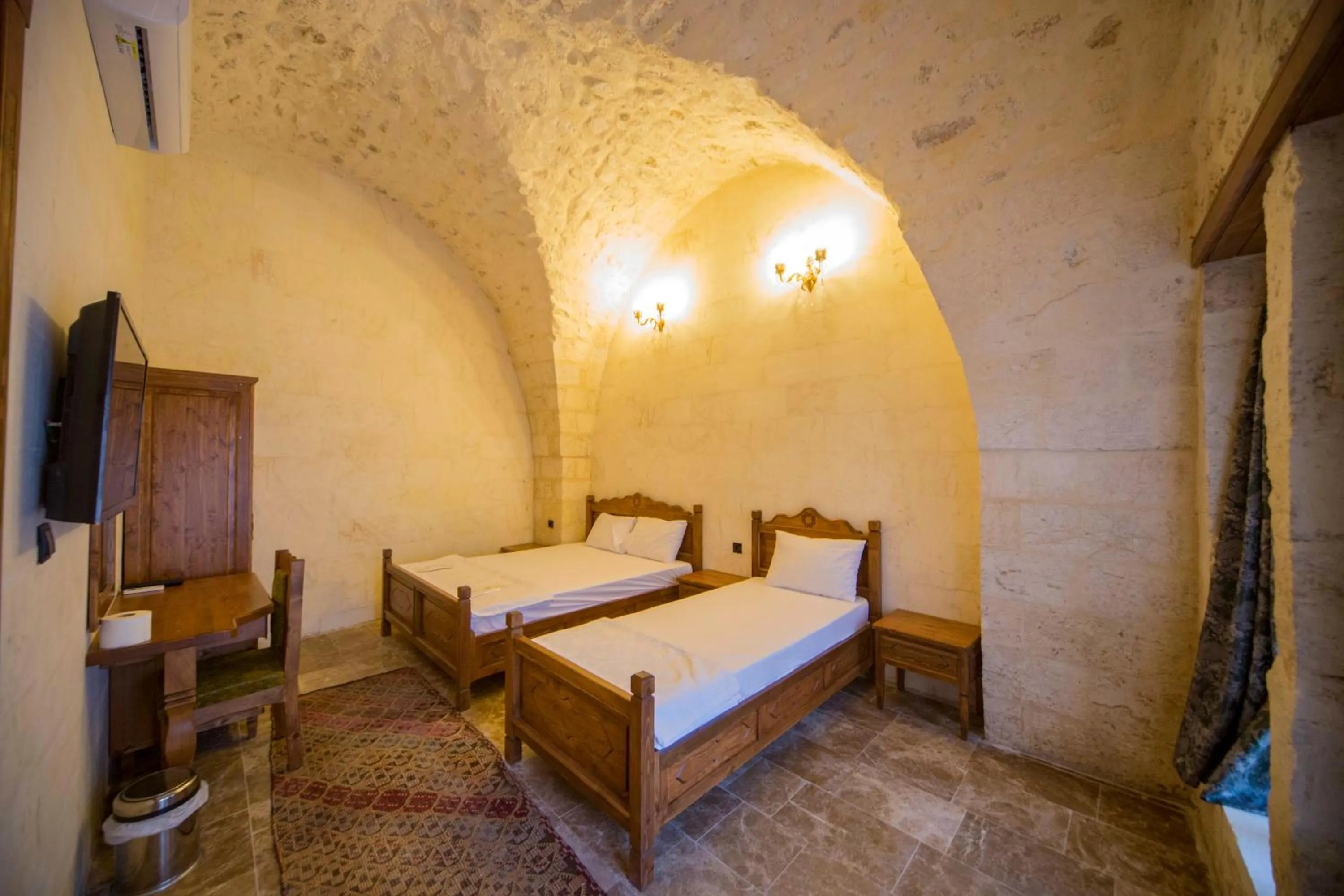 Bed in PALMYRA BOUTIQUE HOTEL