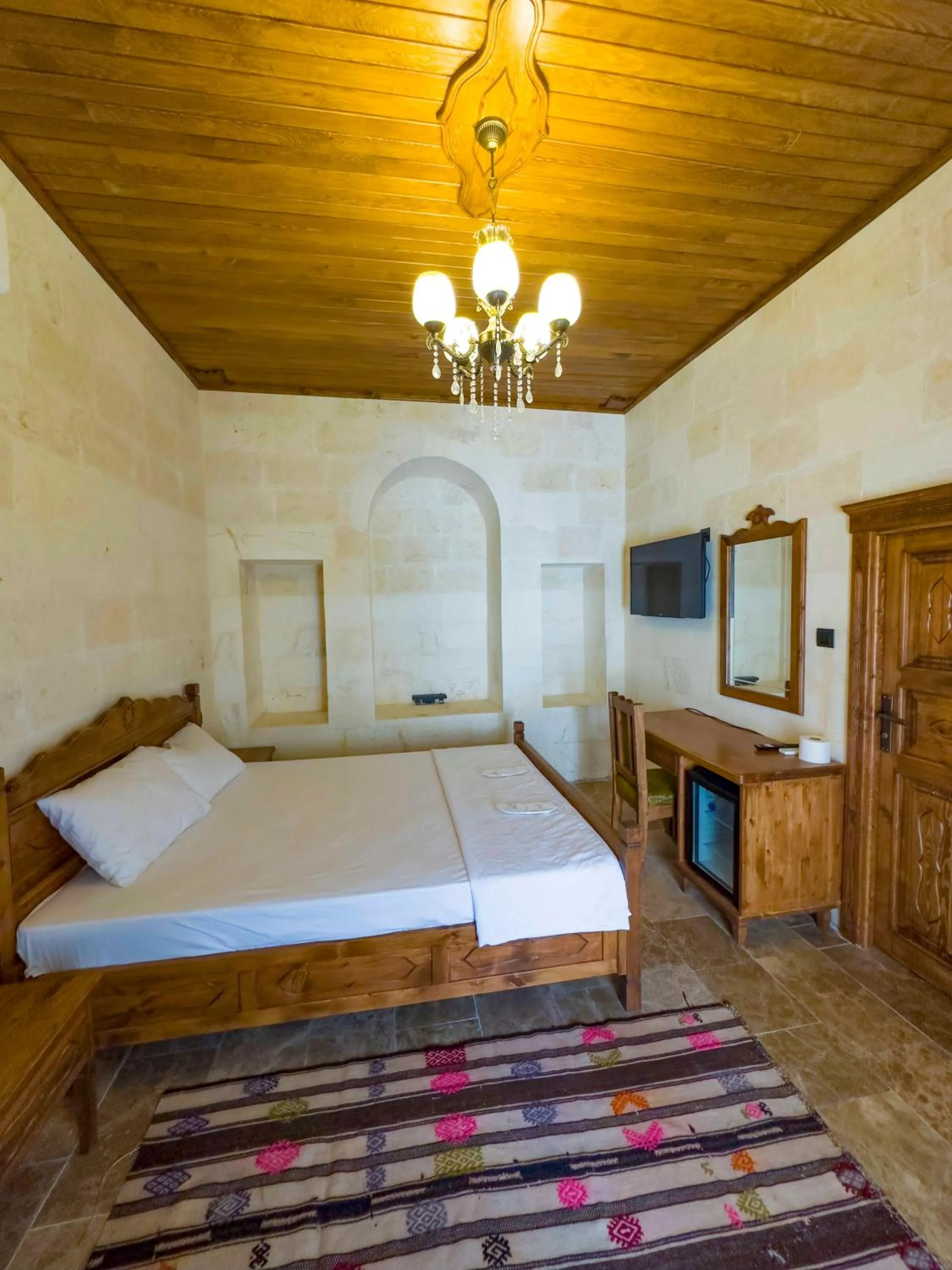 Bed in PALMYRA BOUTIQUE HOTEL