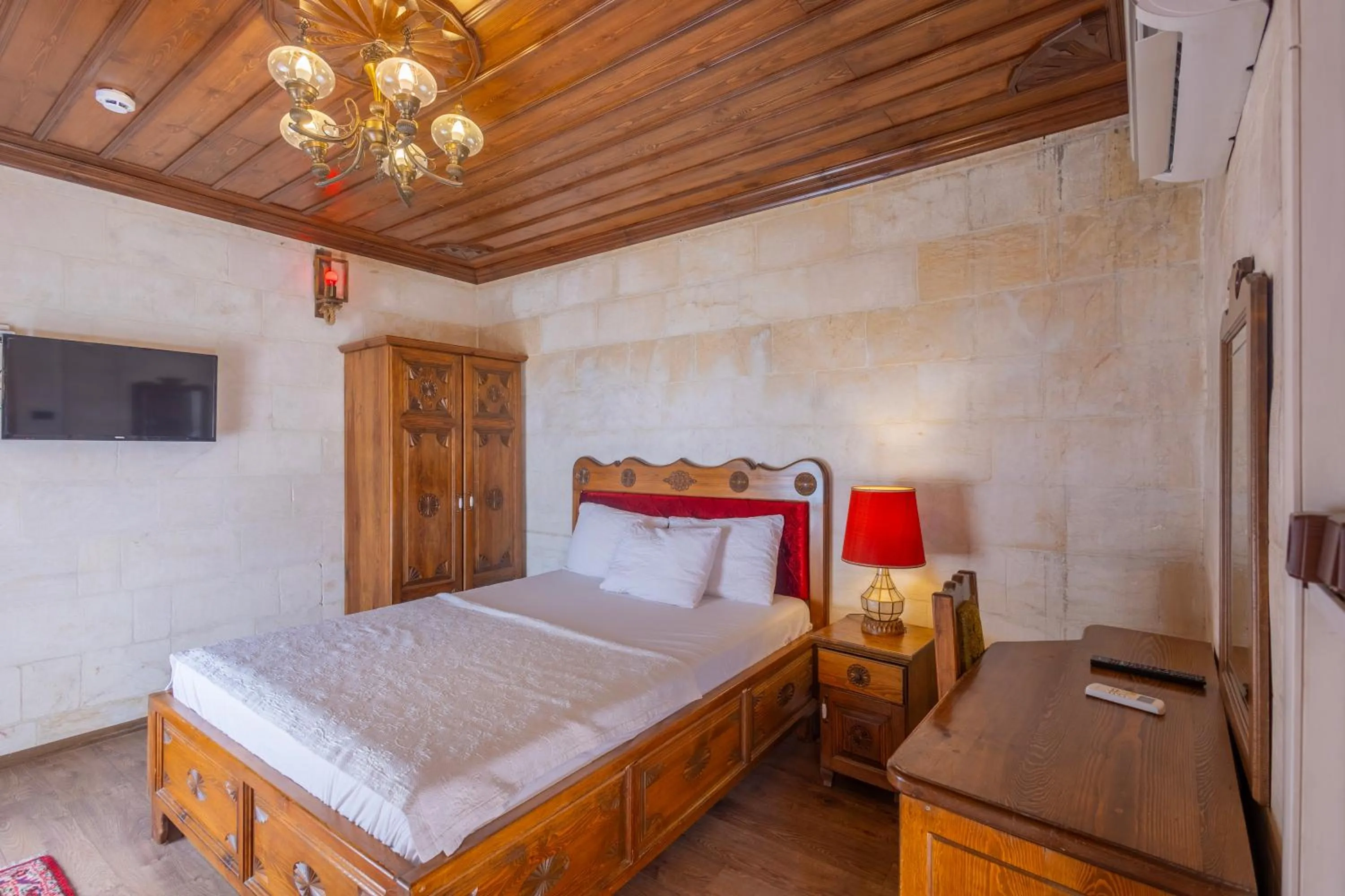 Bed in PALMYRA BOUTIQUE HOTEL