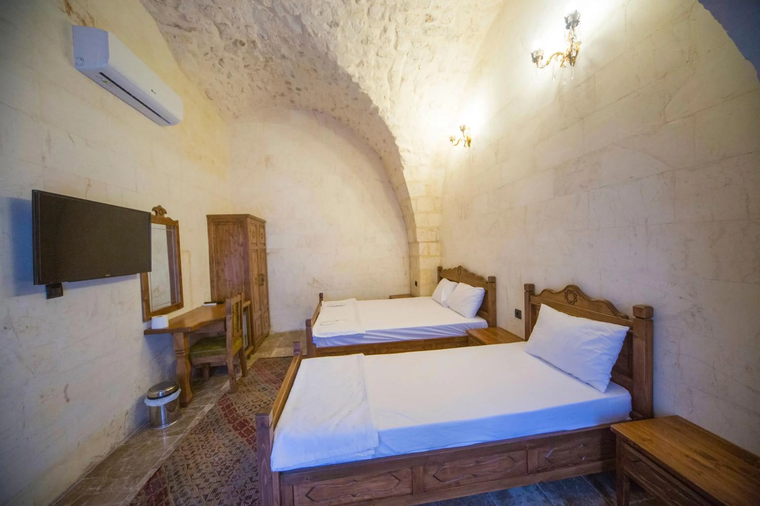 Bed in PALMYRA BOUTIQUE HOTEL