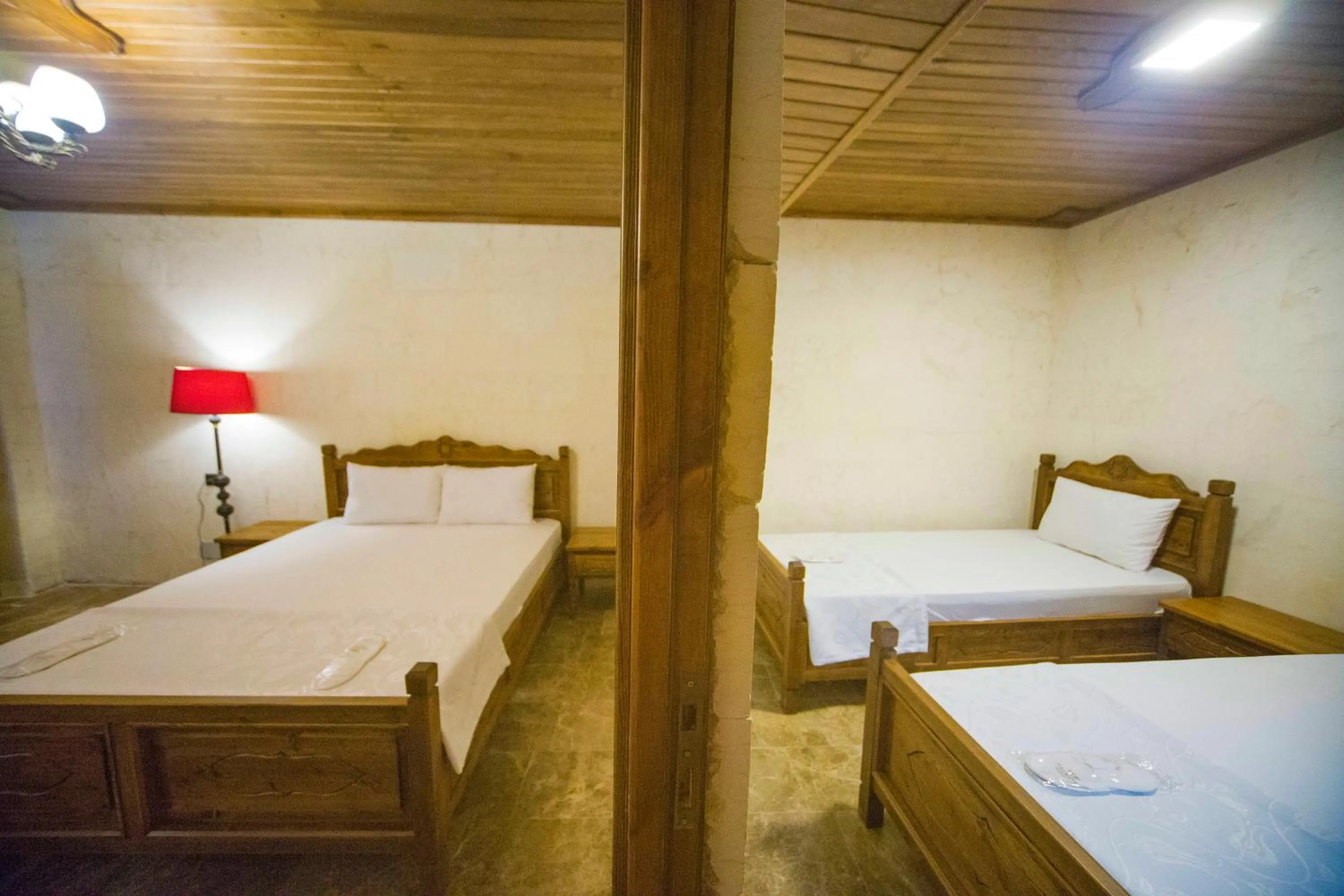 Bed in PALMYRA BOUTIQUE HOTEL