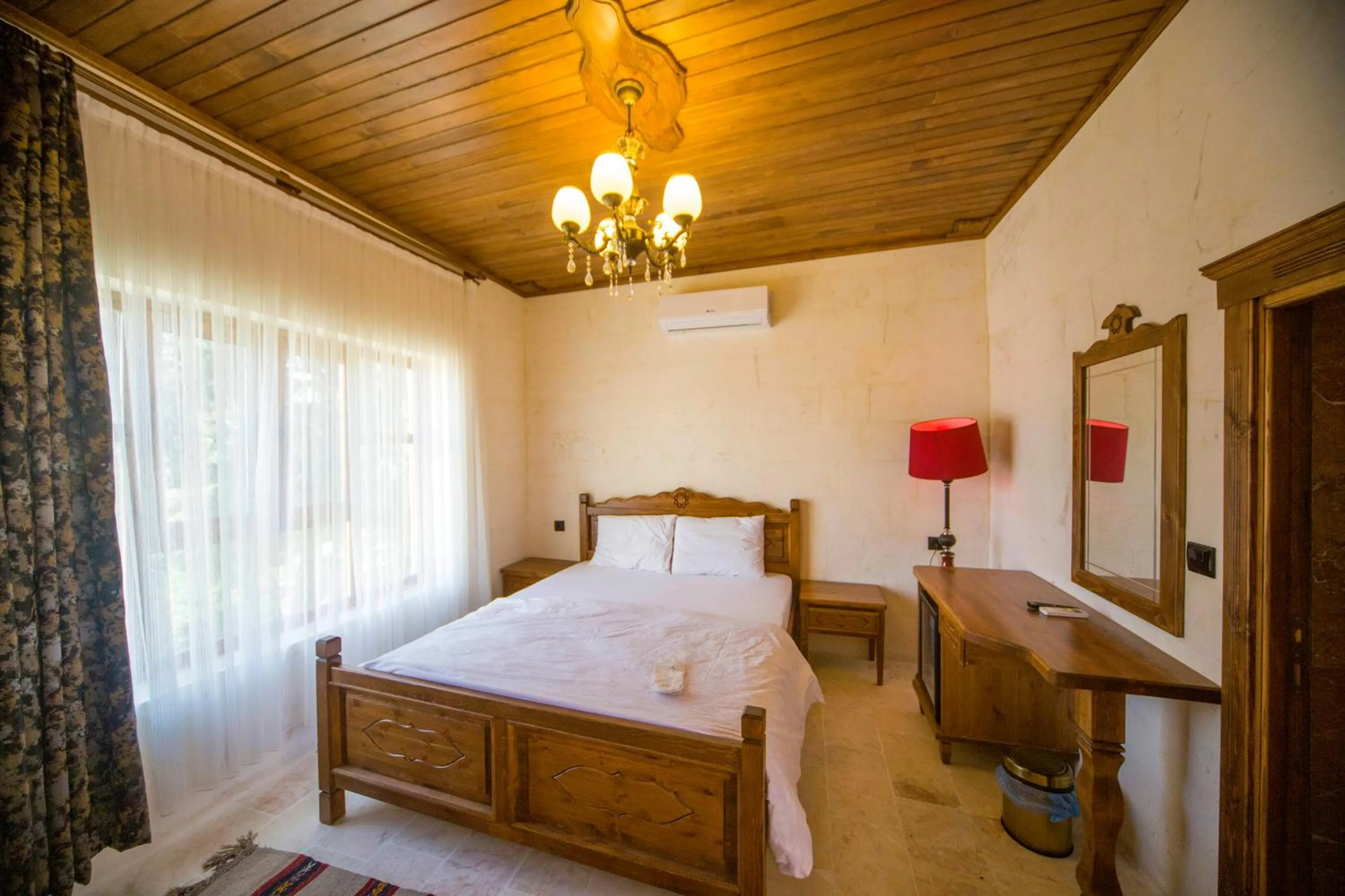 Bed in PALMYRA BOUTIQUE HOTEL