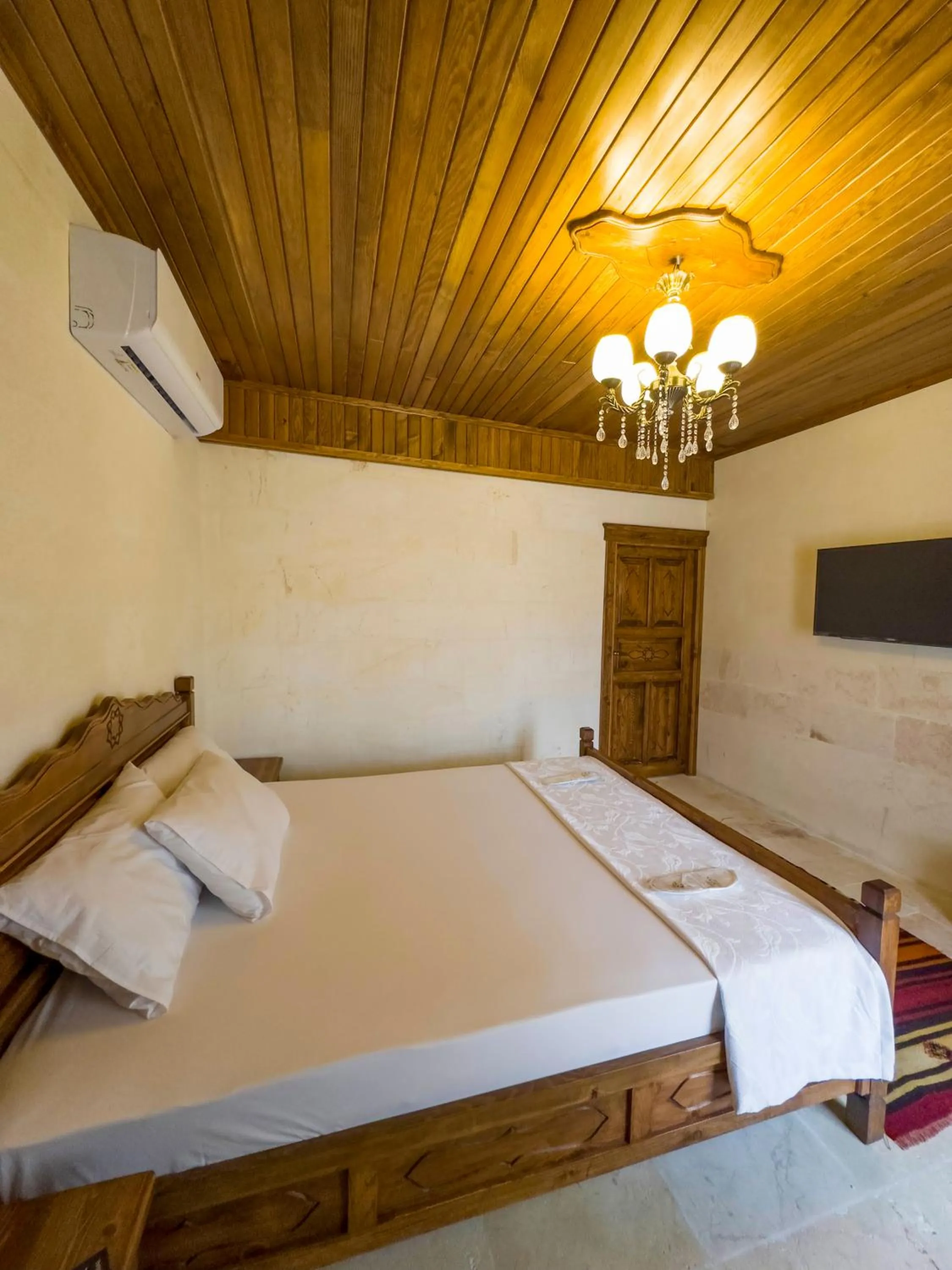 Bed in PALMYRA BOUTIQUE HOTEL