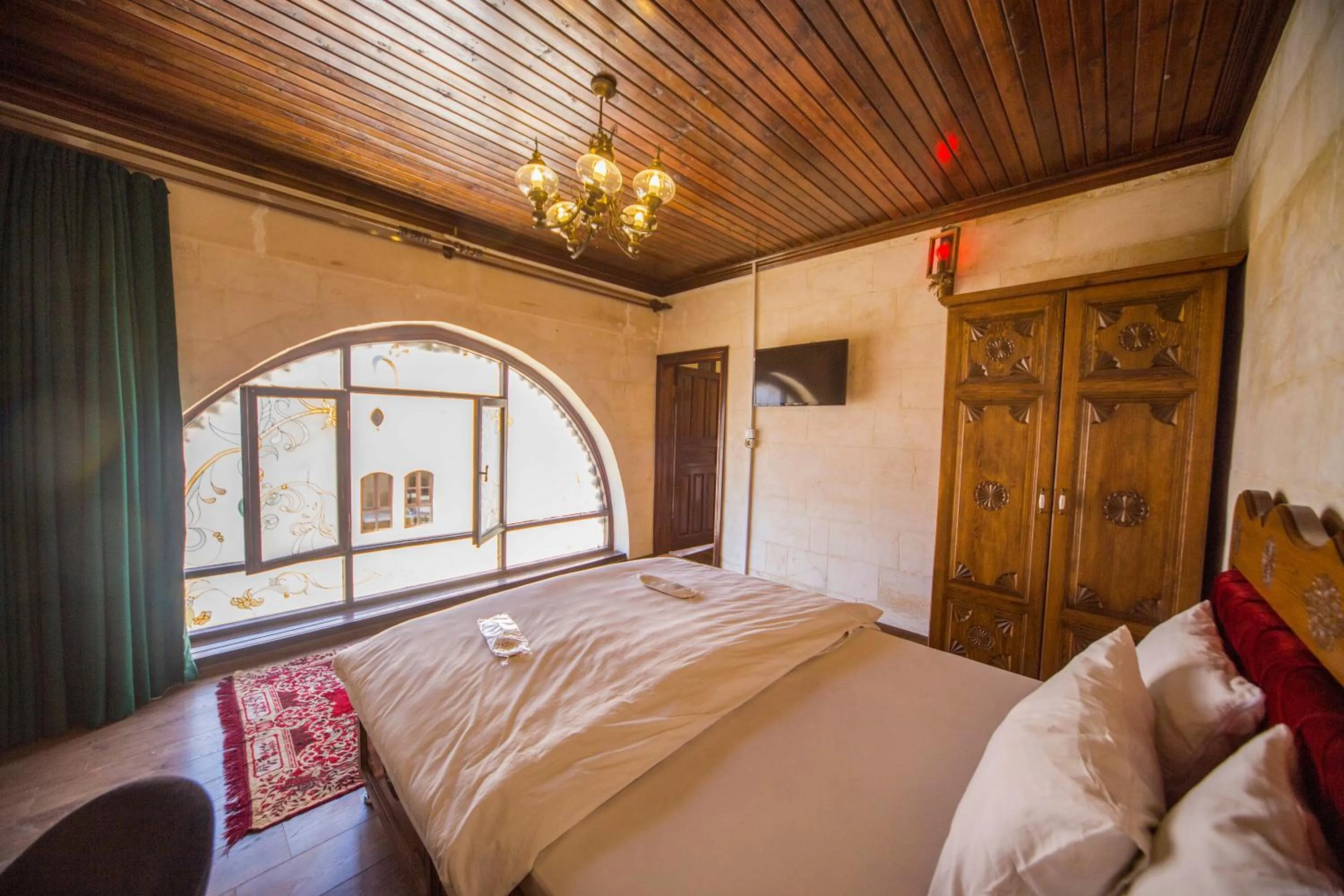 Bed in PALMYRA BOUTIQUE HOTEL