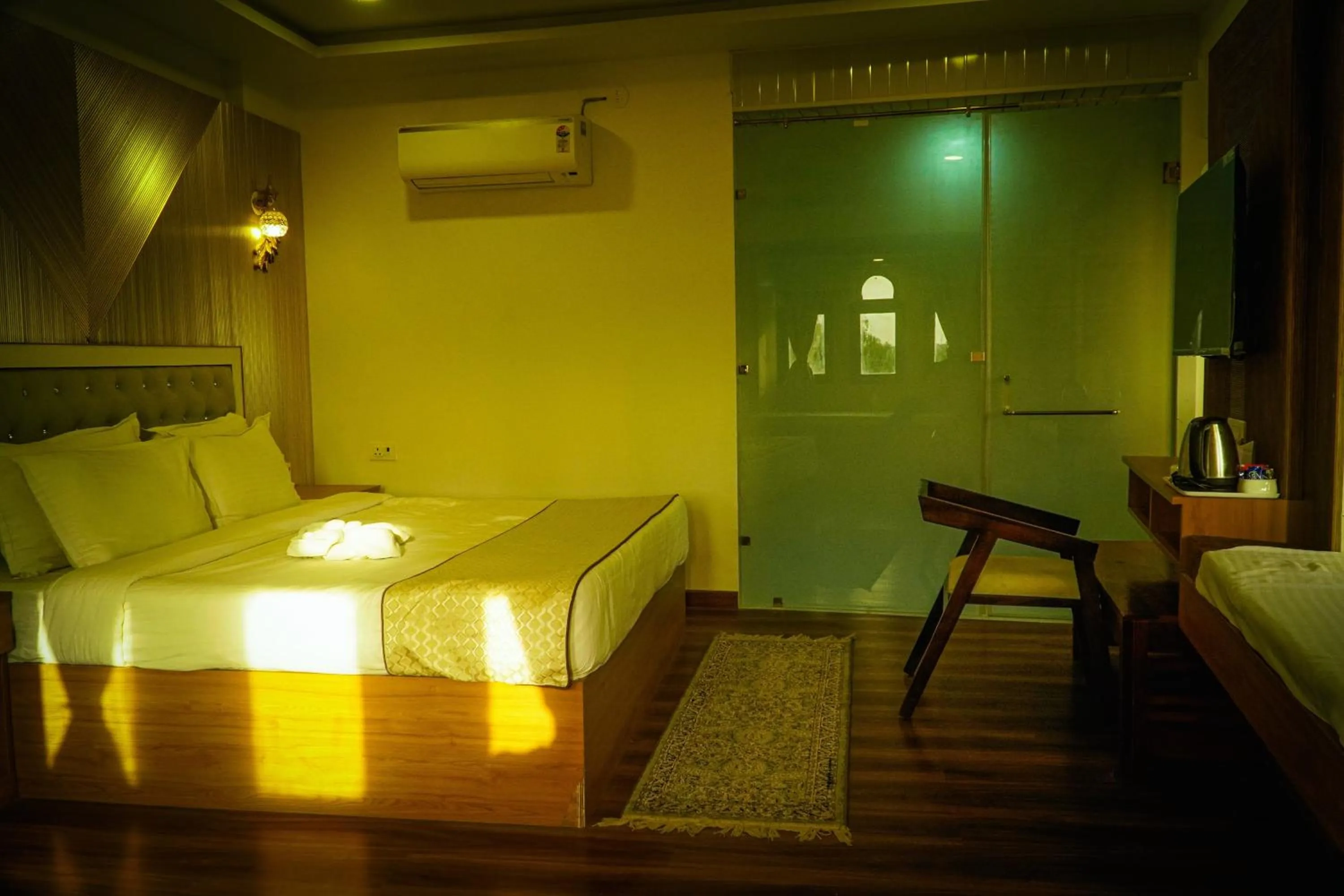 air conditioner, Bed in Hotel Jaisal Inn - Pure Veg
