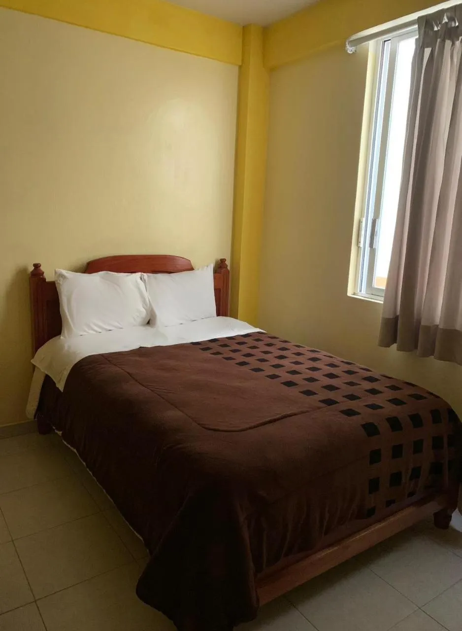 Bed in Hotel Renacimiento