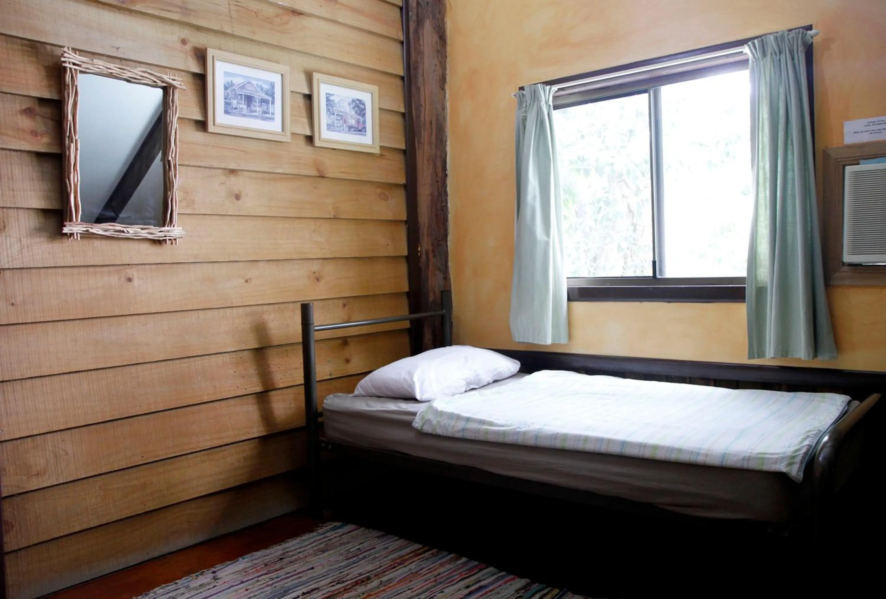 Decorative detail, Bed in Woolshed Eco Lodge