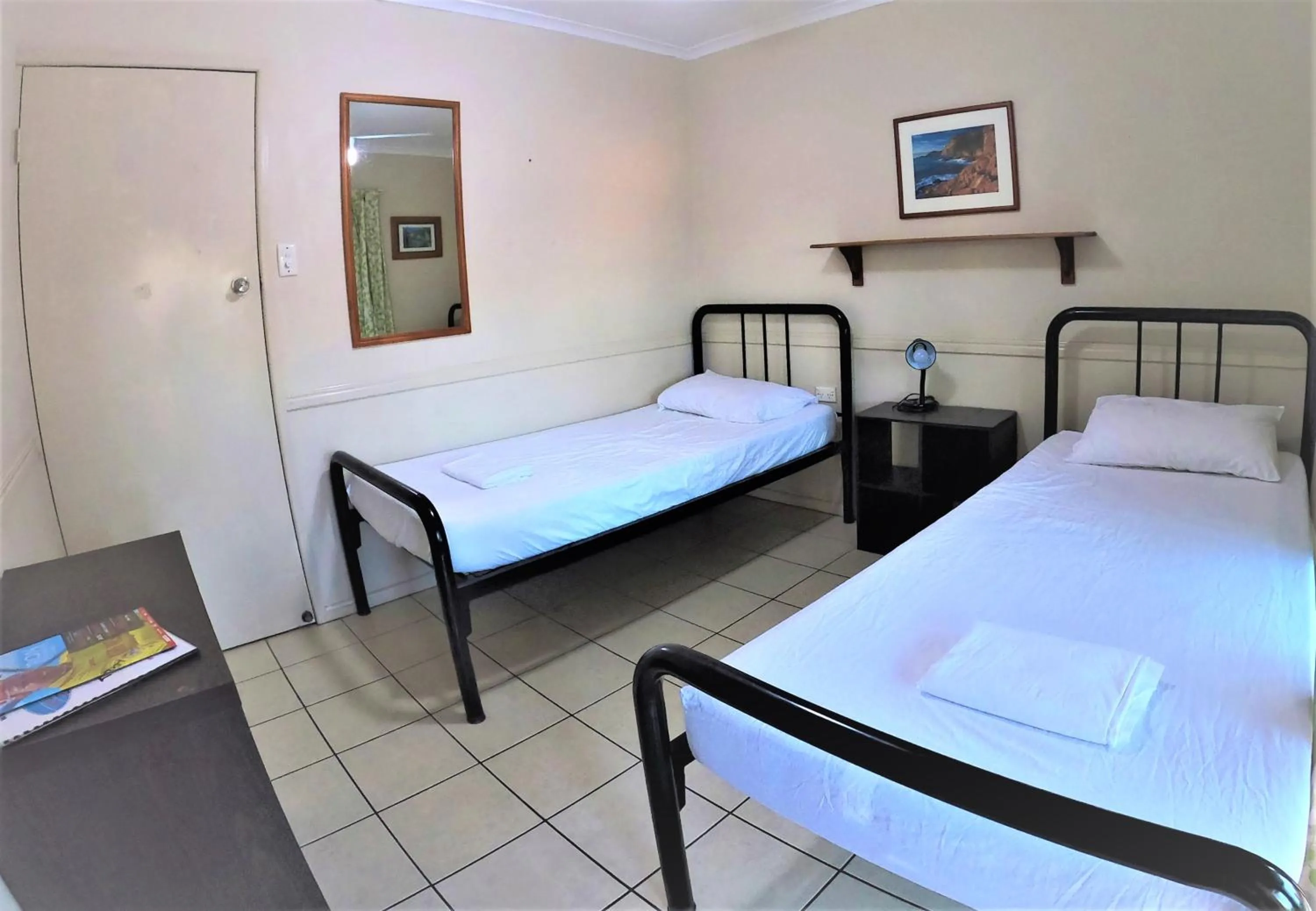 Bed in Woolshed Eco Lodge