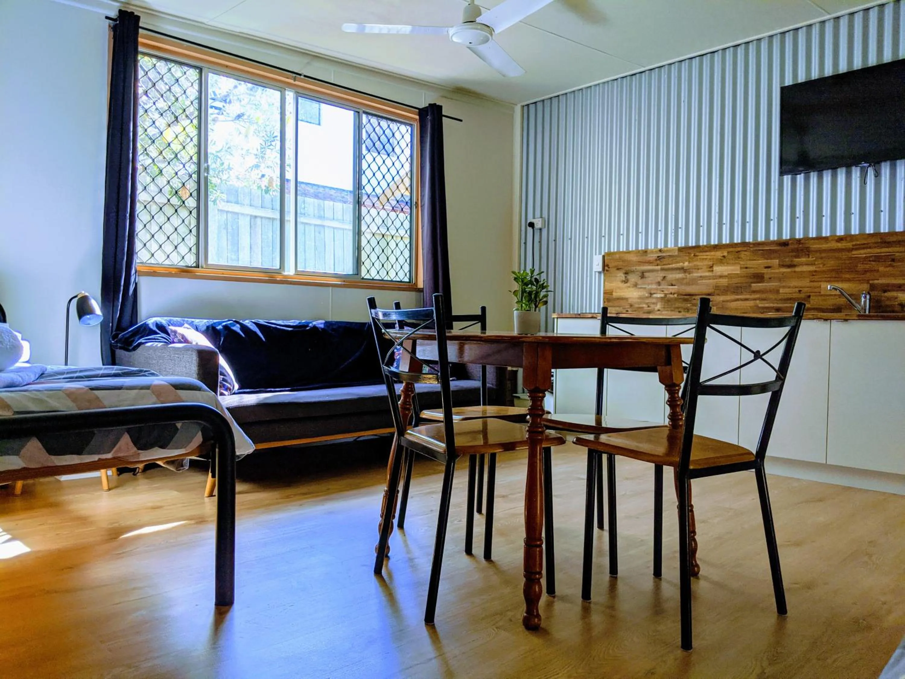Seating area in Woolshed Eco Lodge