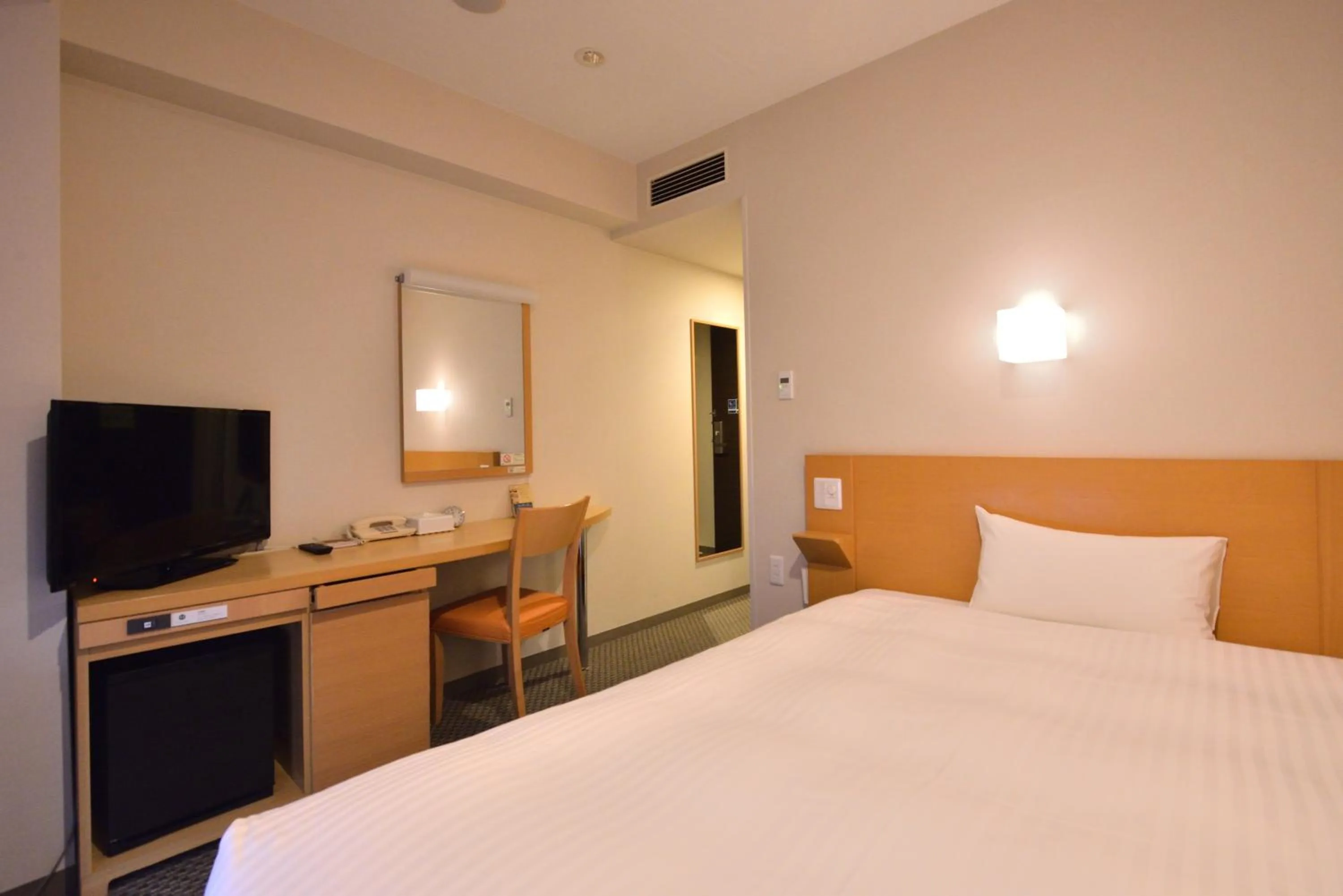 Photo of the whole room, Bed in Hotel Urbic Kagoshima