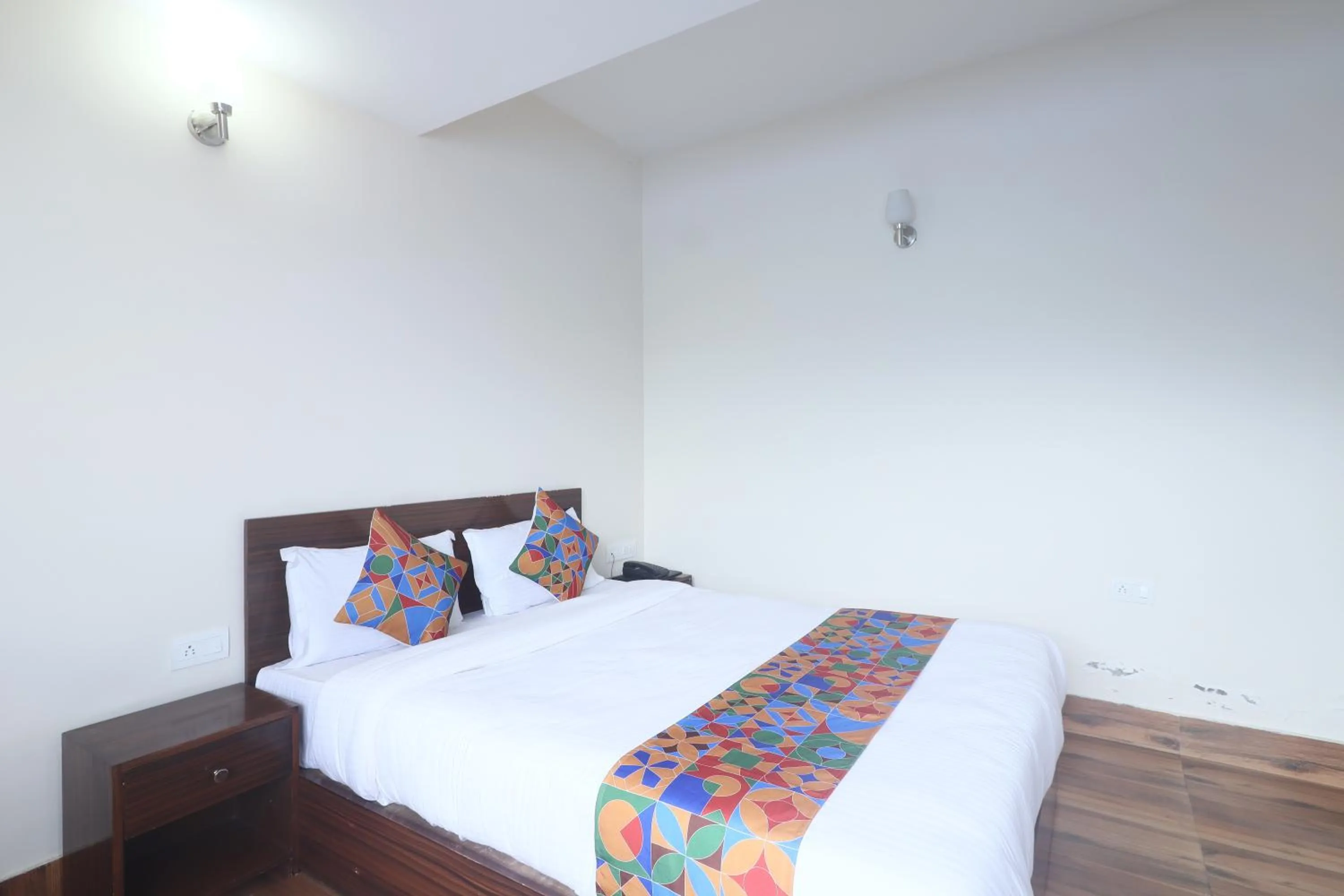 Bed in FabHotel Kutighar Regency