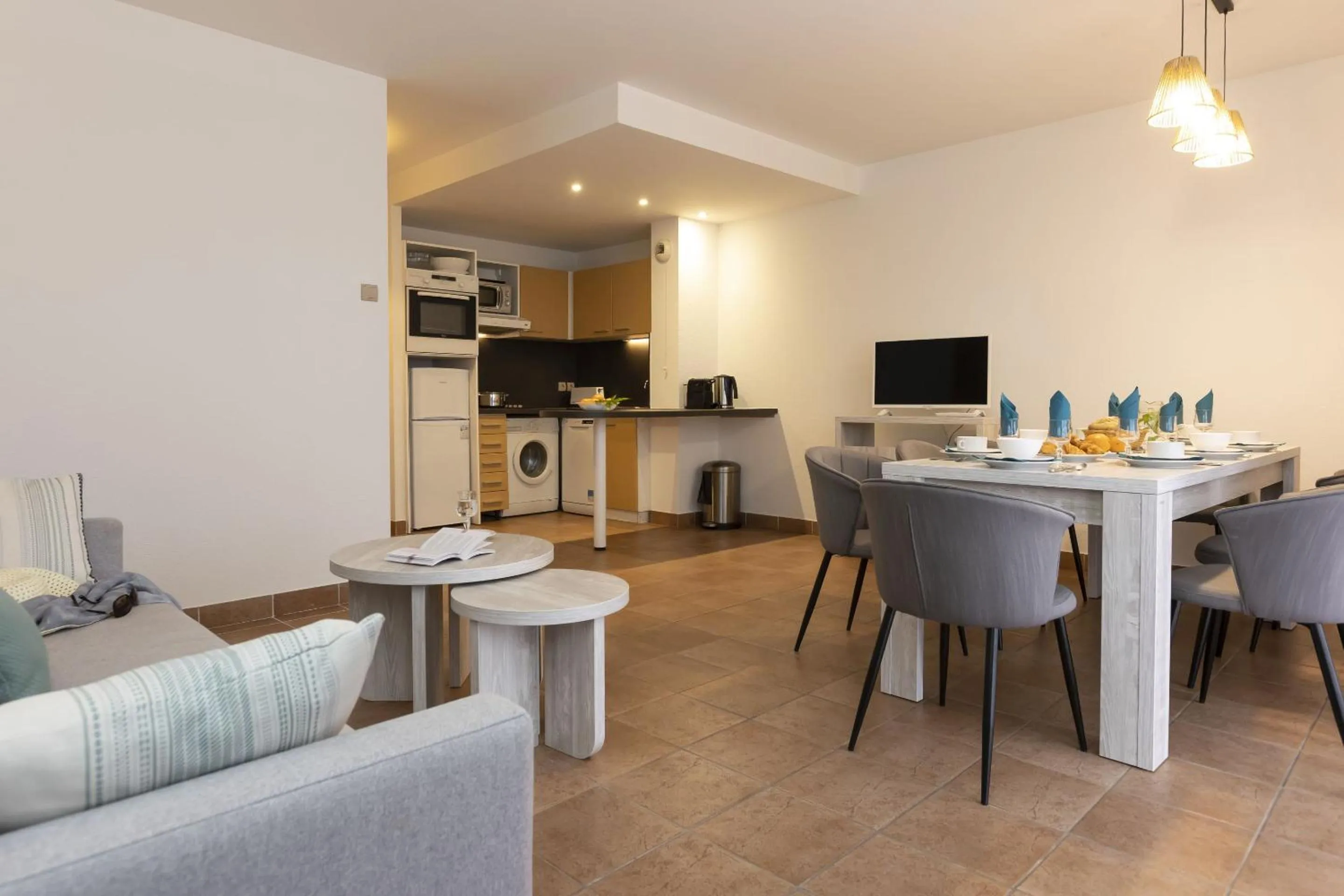 Kitchen or kitchenette in Résidence Odalys Les Greens du Bassin