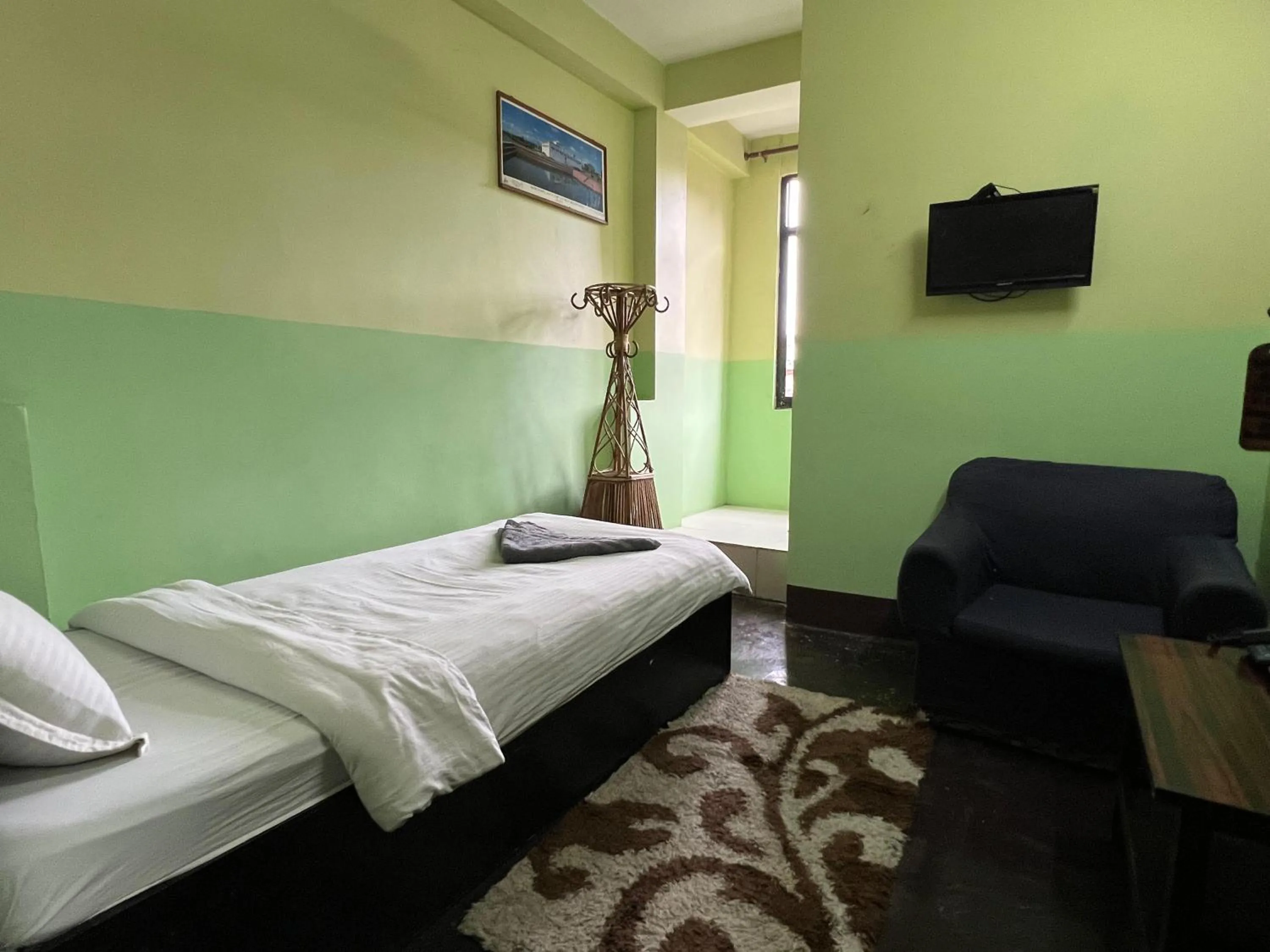 Bed in Metro Eco Hotel