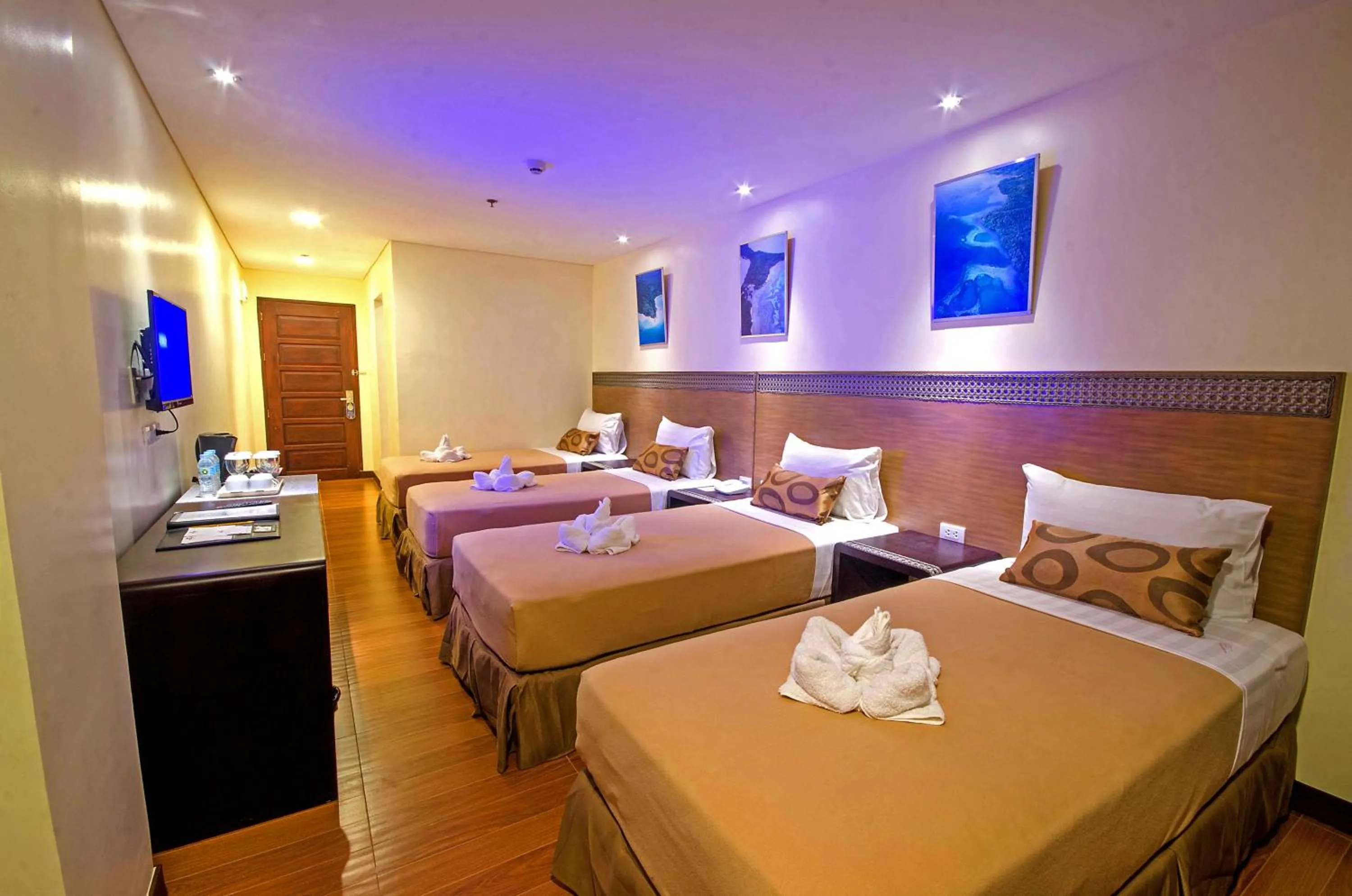 Photo of the whole room, Bed in Fersal Hotel - Puerto Princesa