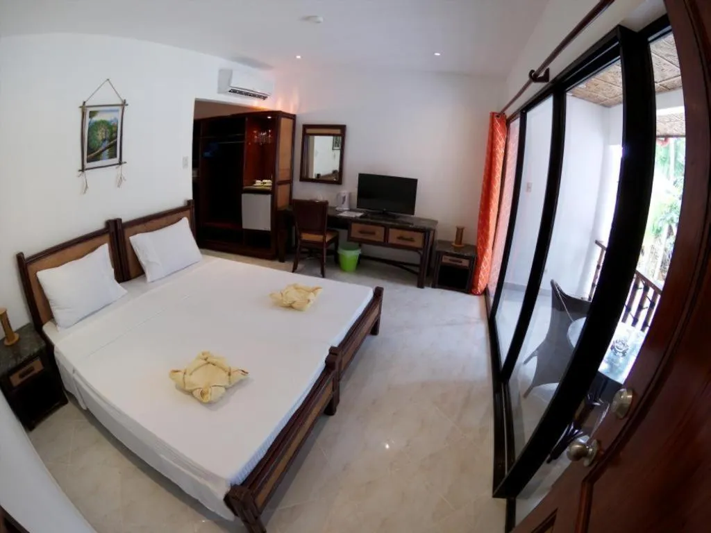 Bed in Alona Vida Beach Resort