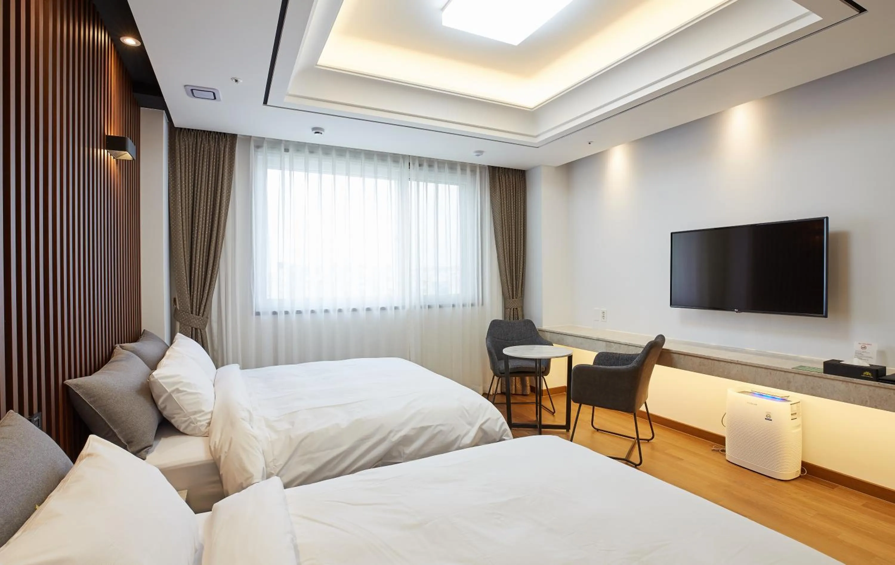 Bed in Noble Stay Hotel