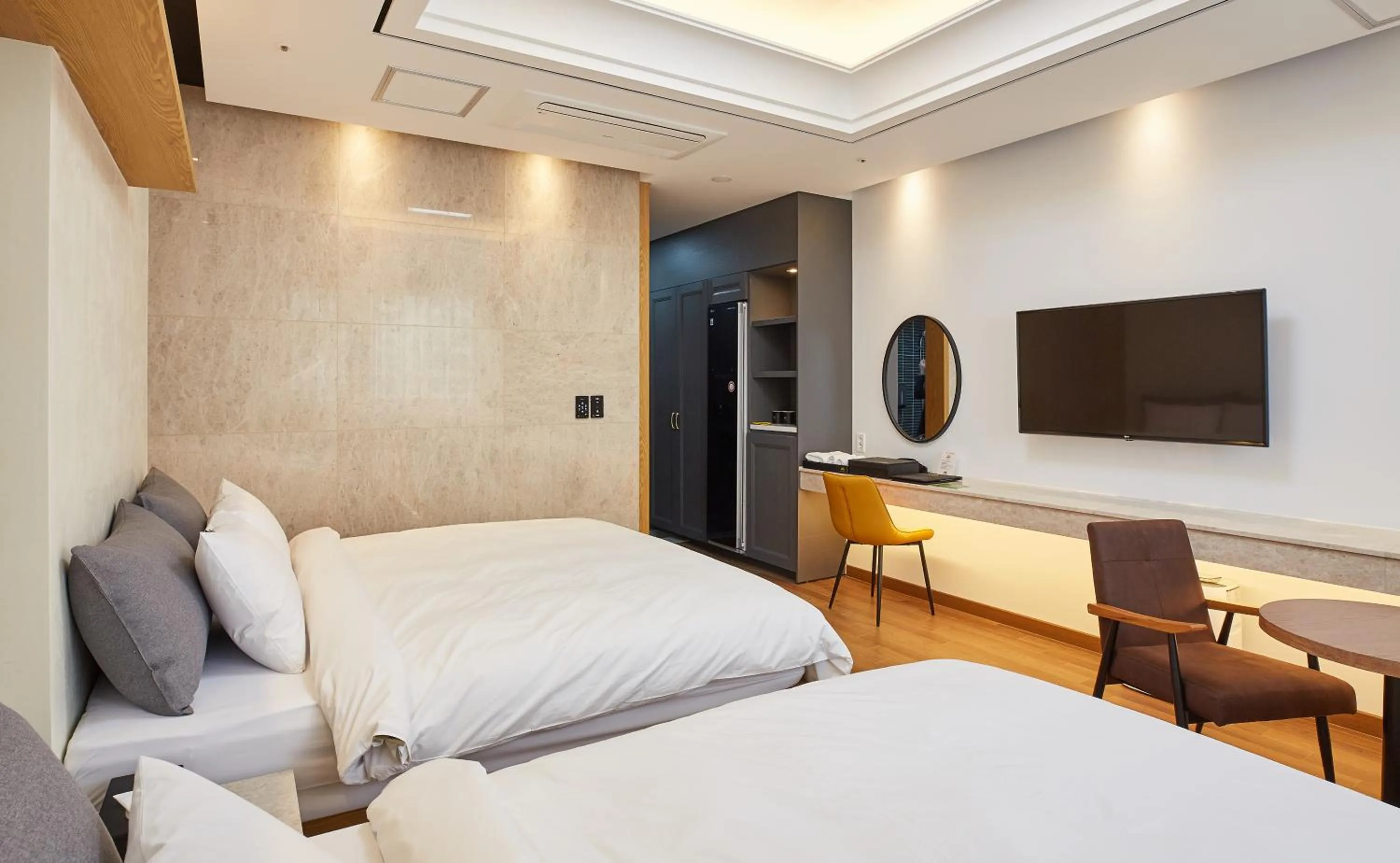 Bed in Noble Stay Hotel