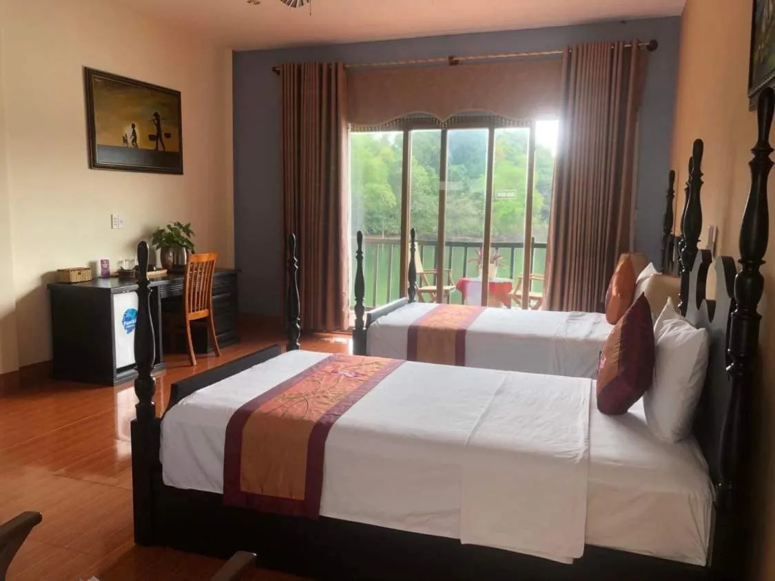 Bed in Phong Nha Lake House Resort