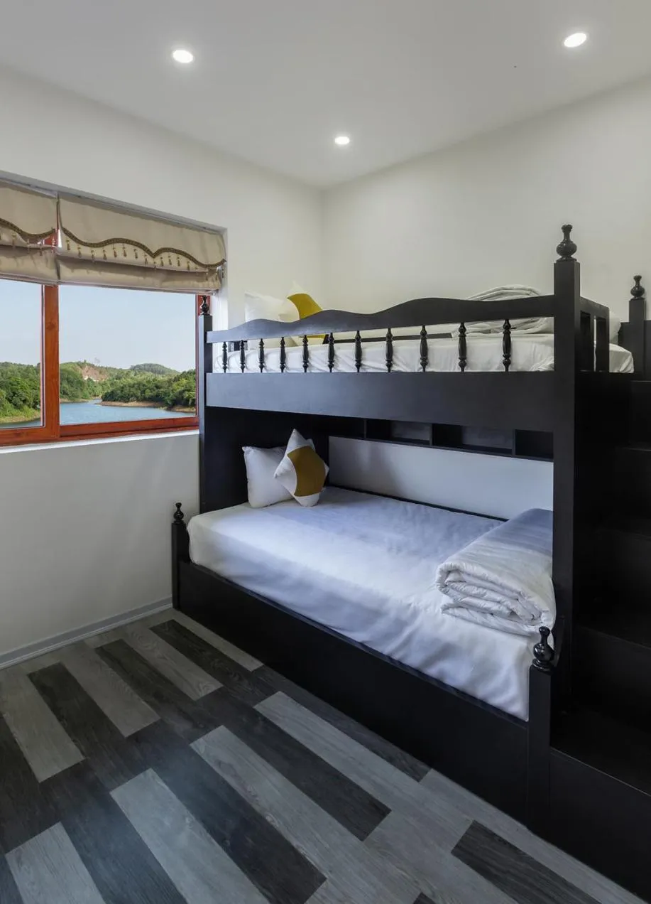 Bed in Phong Nha Lake House Resort