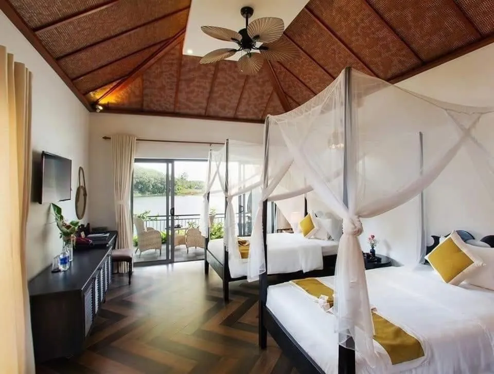 Bed in Phong Nha Lake House Resort