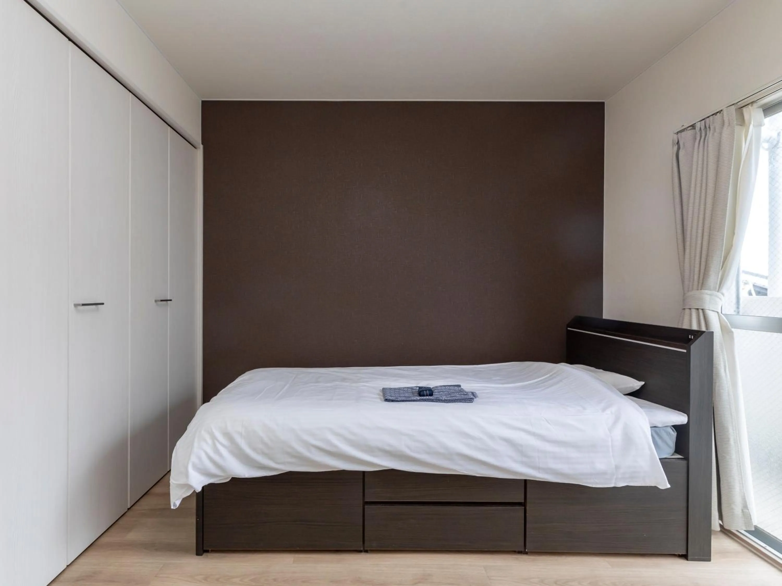 Bed in Tabist Motodai Business Hotel Kanonji