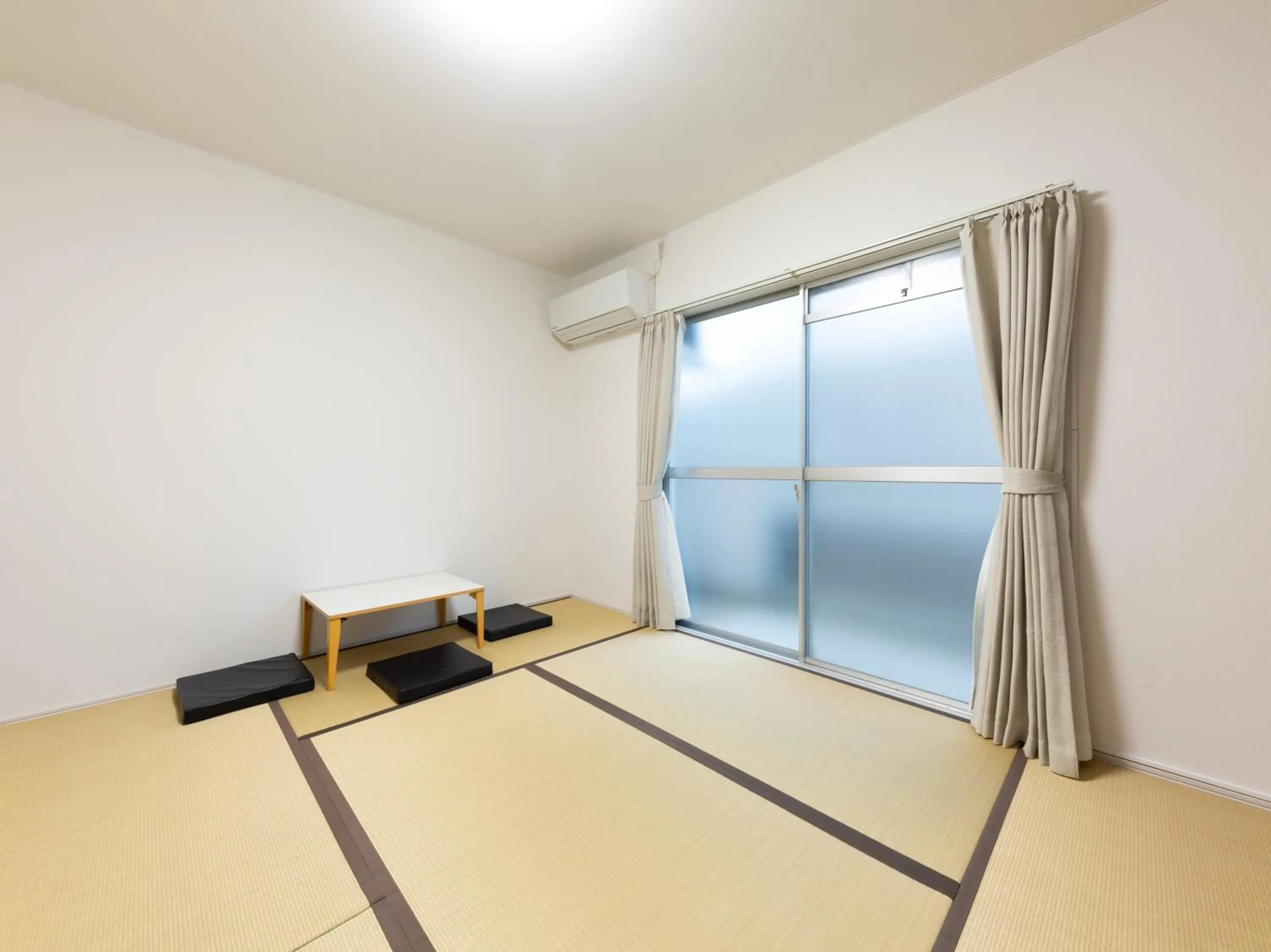 Bed in Tabist Motodai Business Hotel Kanonji
