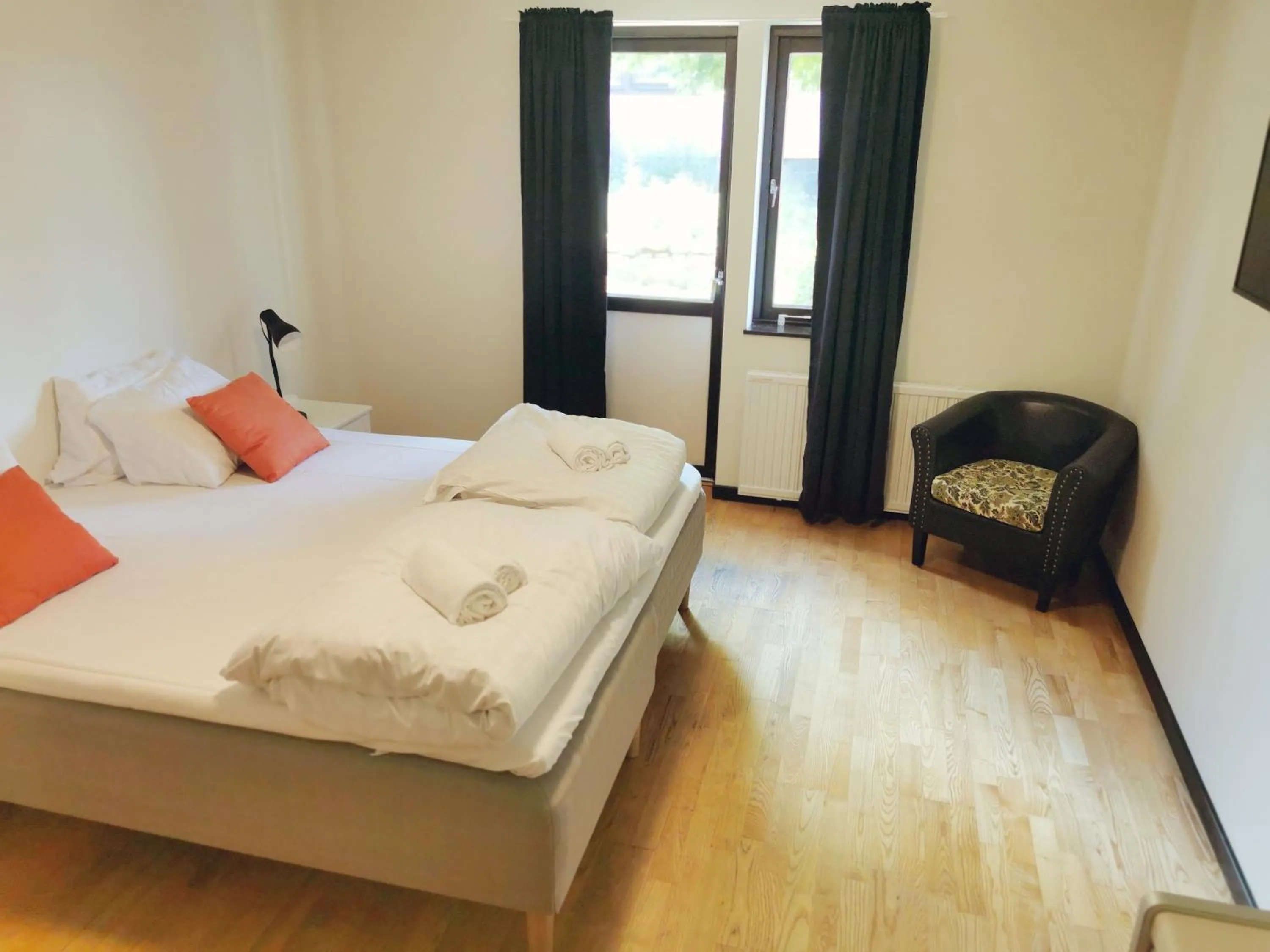 Bed in Green Door Hotel