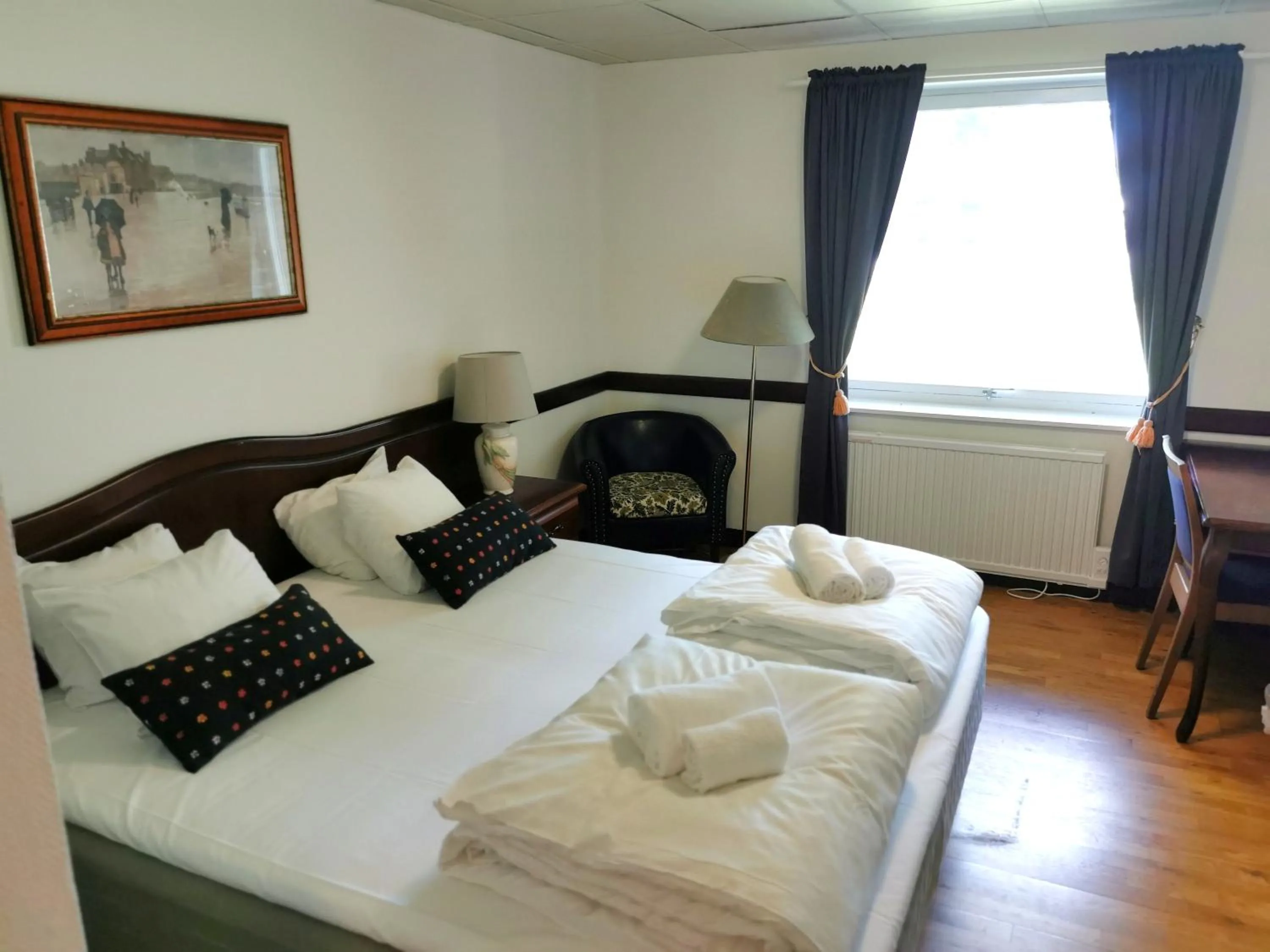 Bed in Green Door Hotel